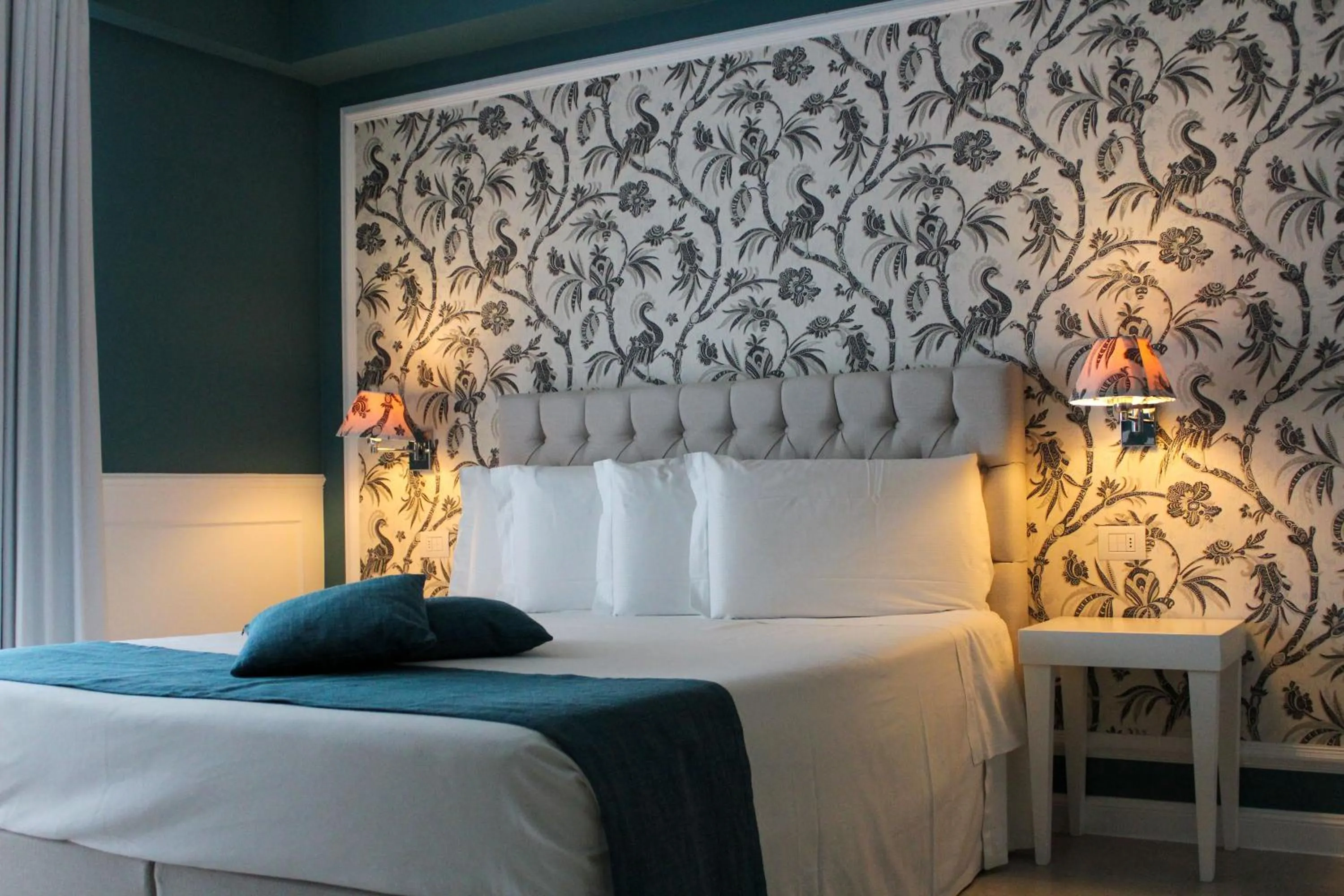 Bed in Bianco Riccio Suite Hotel