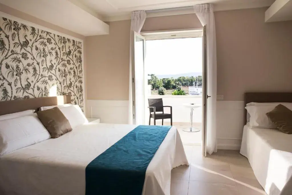 Bed in Bianco Riccio Suite Hotel Bed in Bianco Riccio Suite Hotel