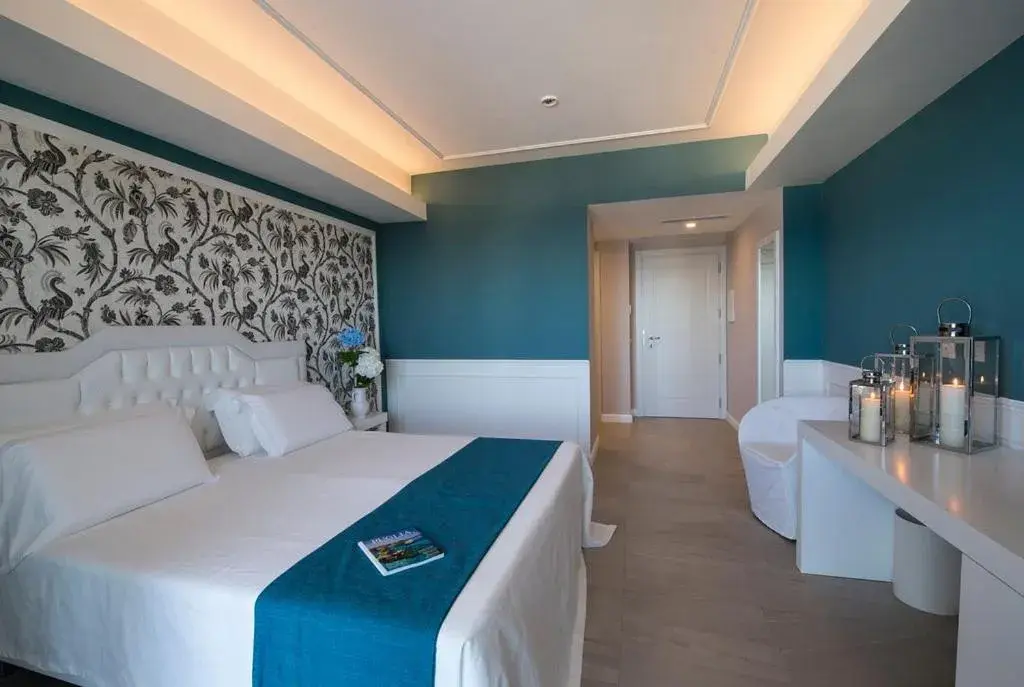 Bed in Bianco Riccio Suite Hotel Bed in Bianco Riccio Suite Hotel