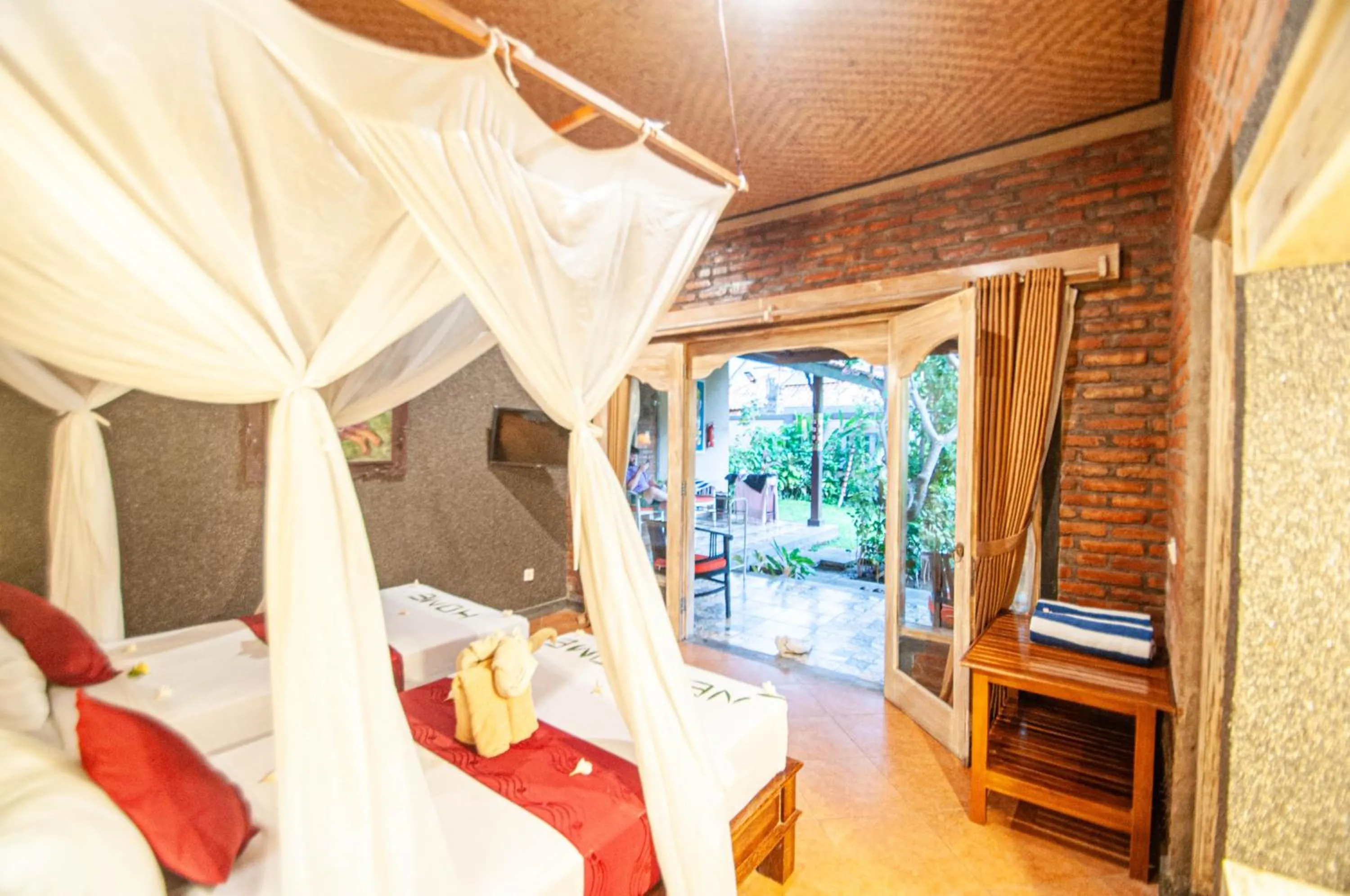 Bedroom, Bed in Kubuku Eco Dive Lodge and Yoga