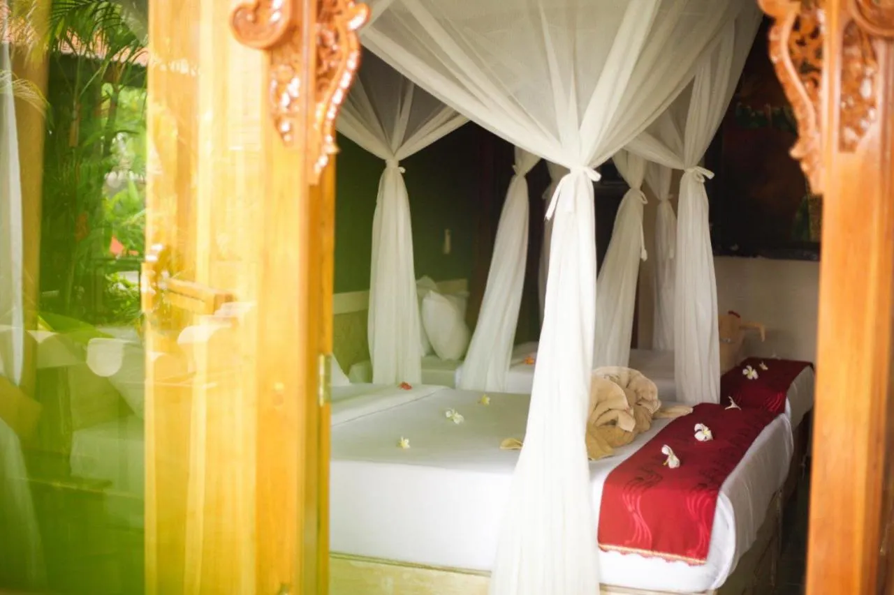 Bed in Kubuku Eco Dive Lodge and Yoga