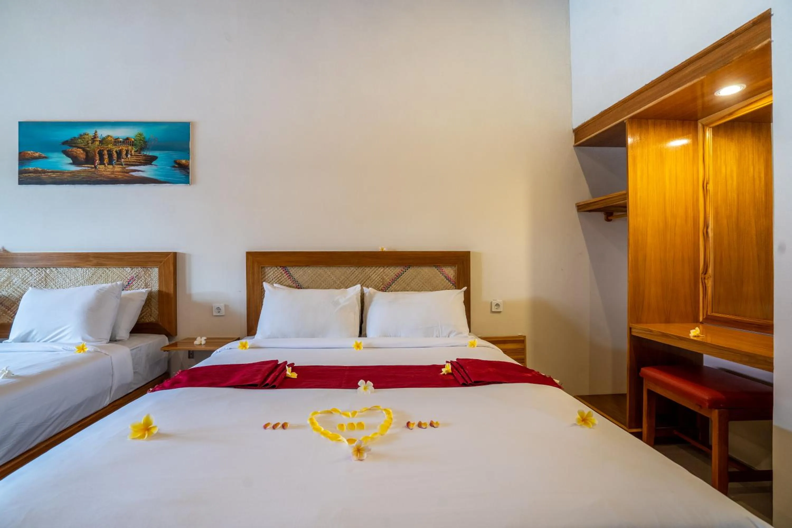 Bed in Kubuku Eco Dive Lodge and Yoga