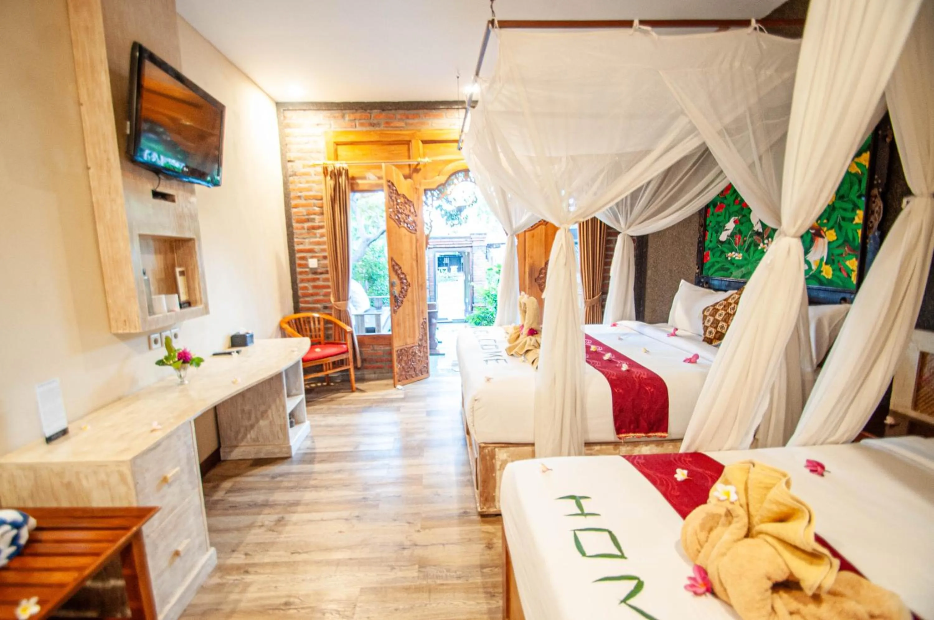 TV and multimedia, Bed in Kubuku Eco Dive Lodge and Yoga