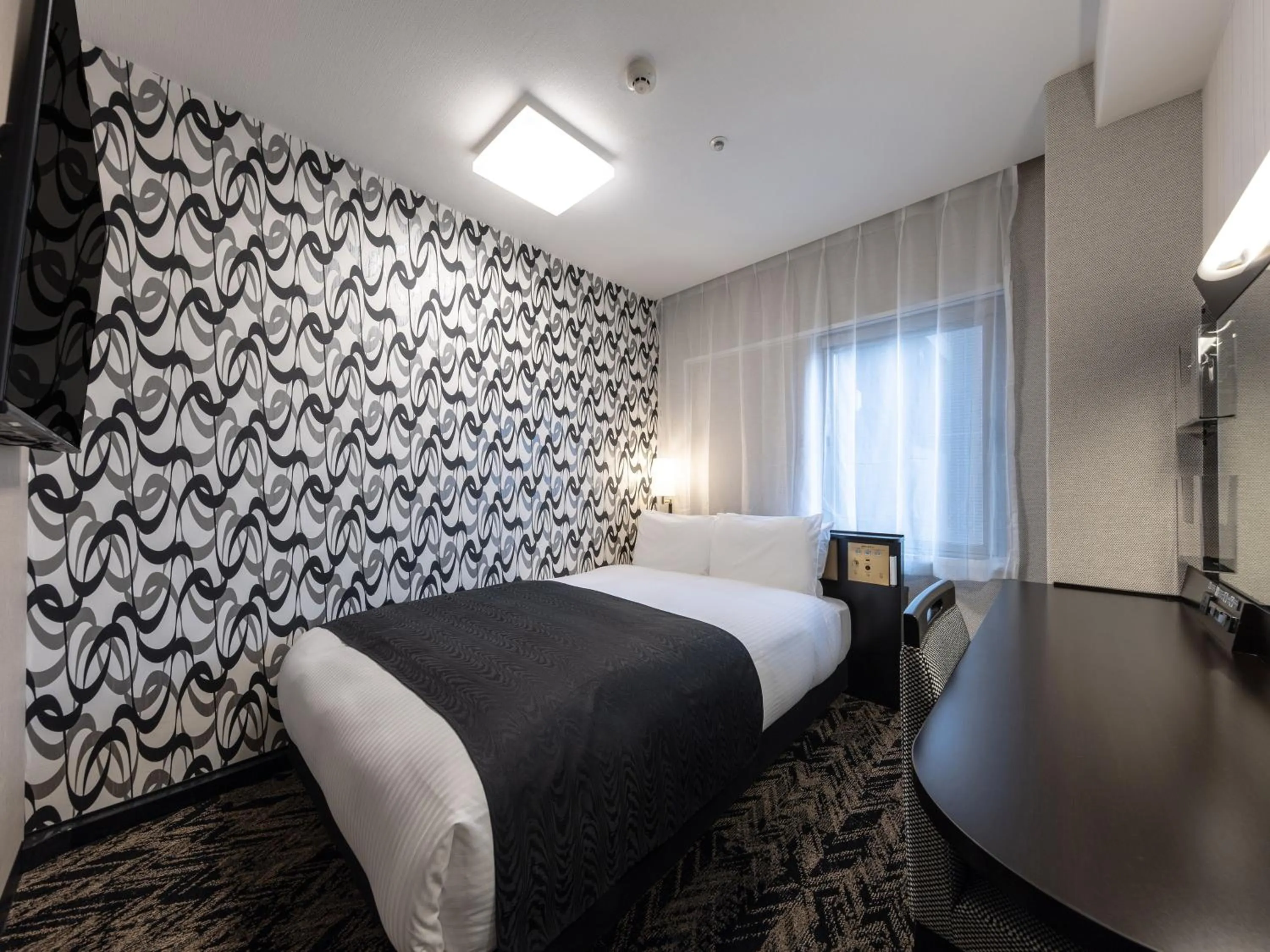 Photo of the whole room, Bed in APA Hotel Himeji Ekikita