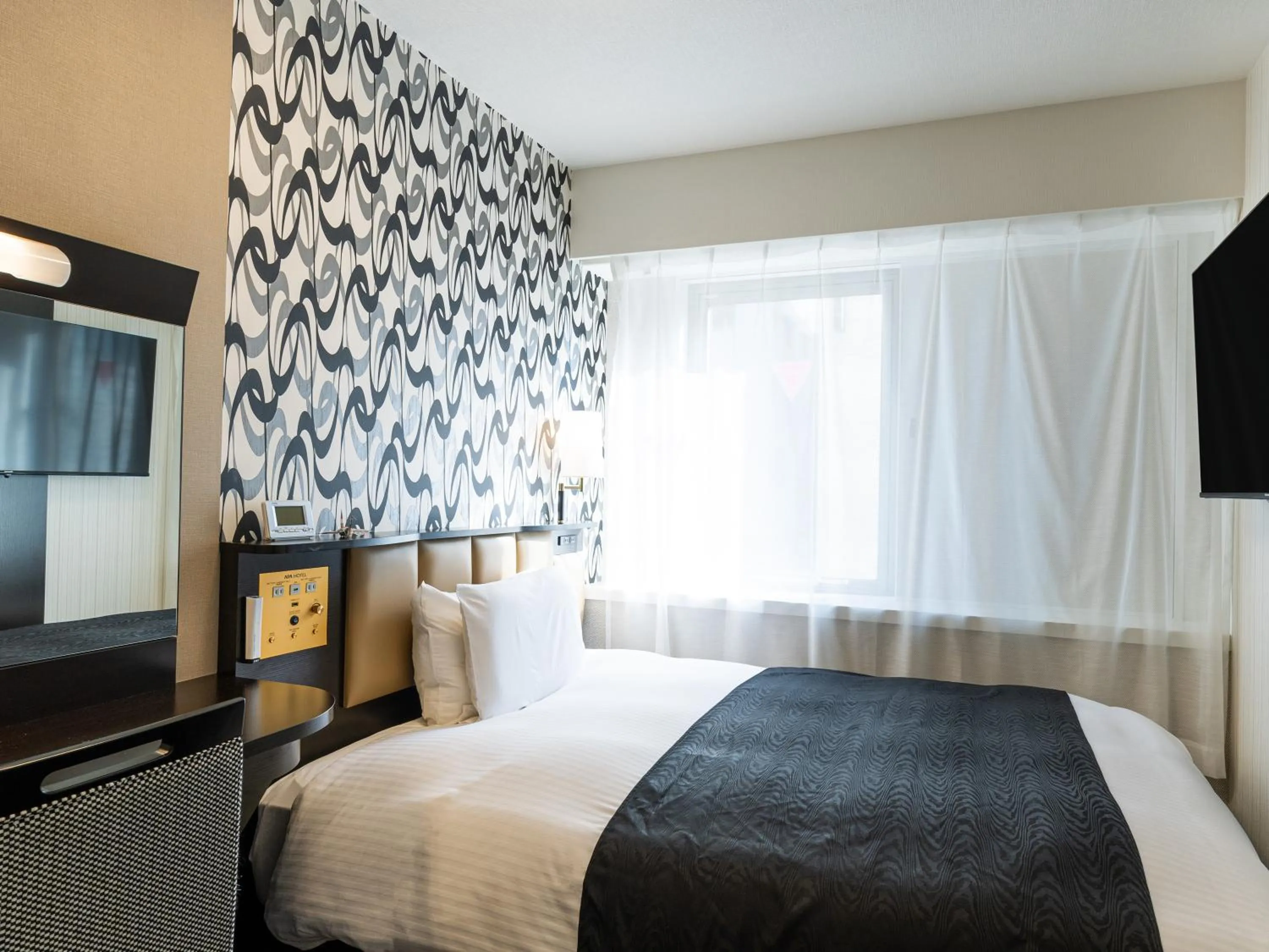 Photo of the whole room, Bed in APA Hotel Himeji Ekikita