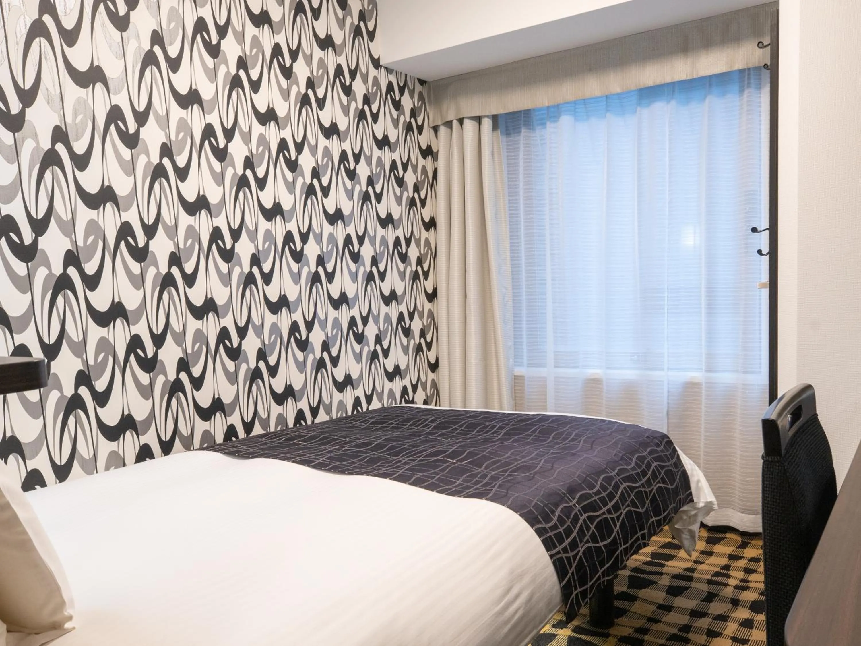 Photo of the whole room, Bed in APA Hotel Shimbashi Onarimon