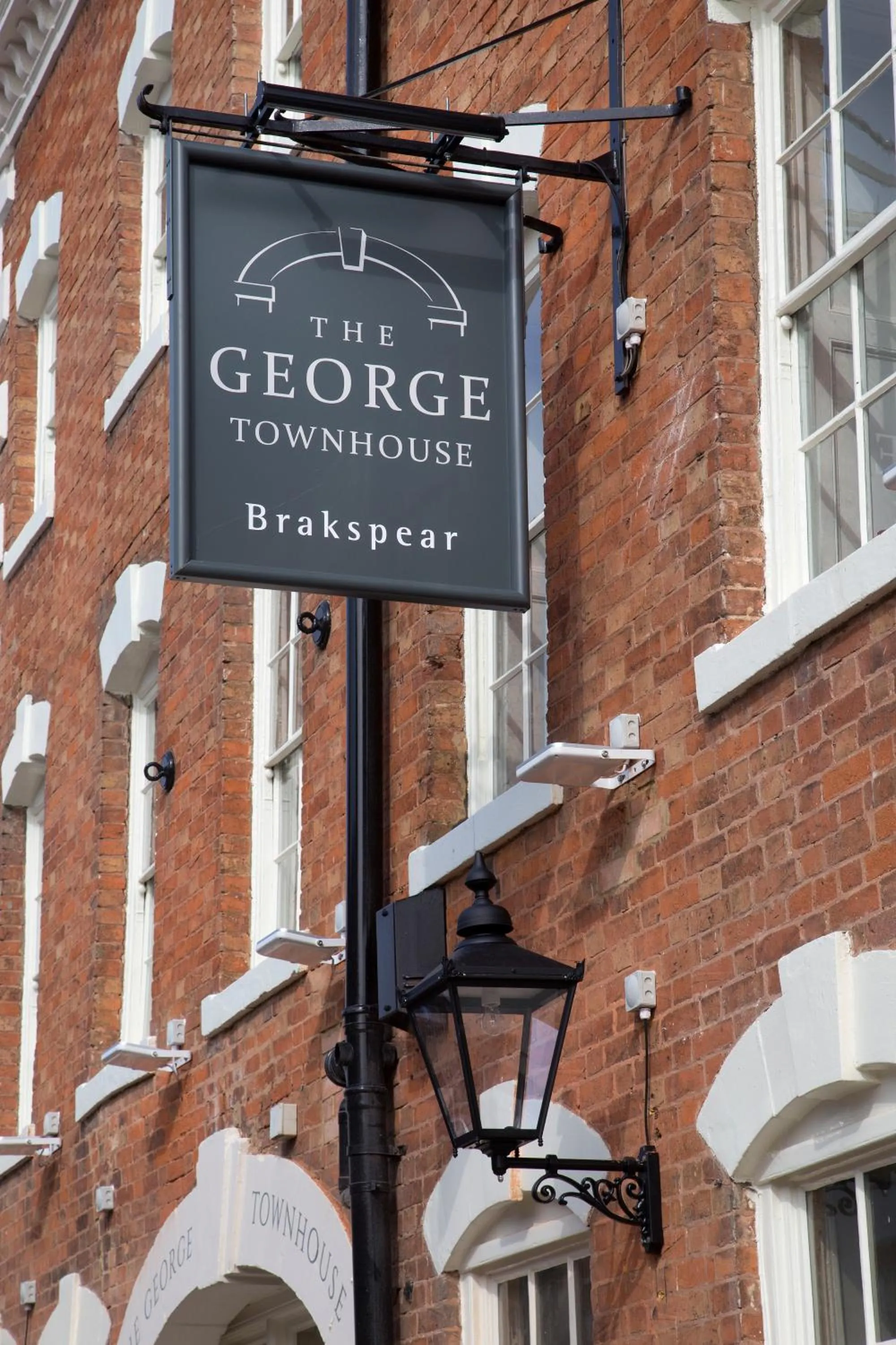 Property logo or sign in The George Townhouse