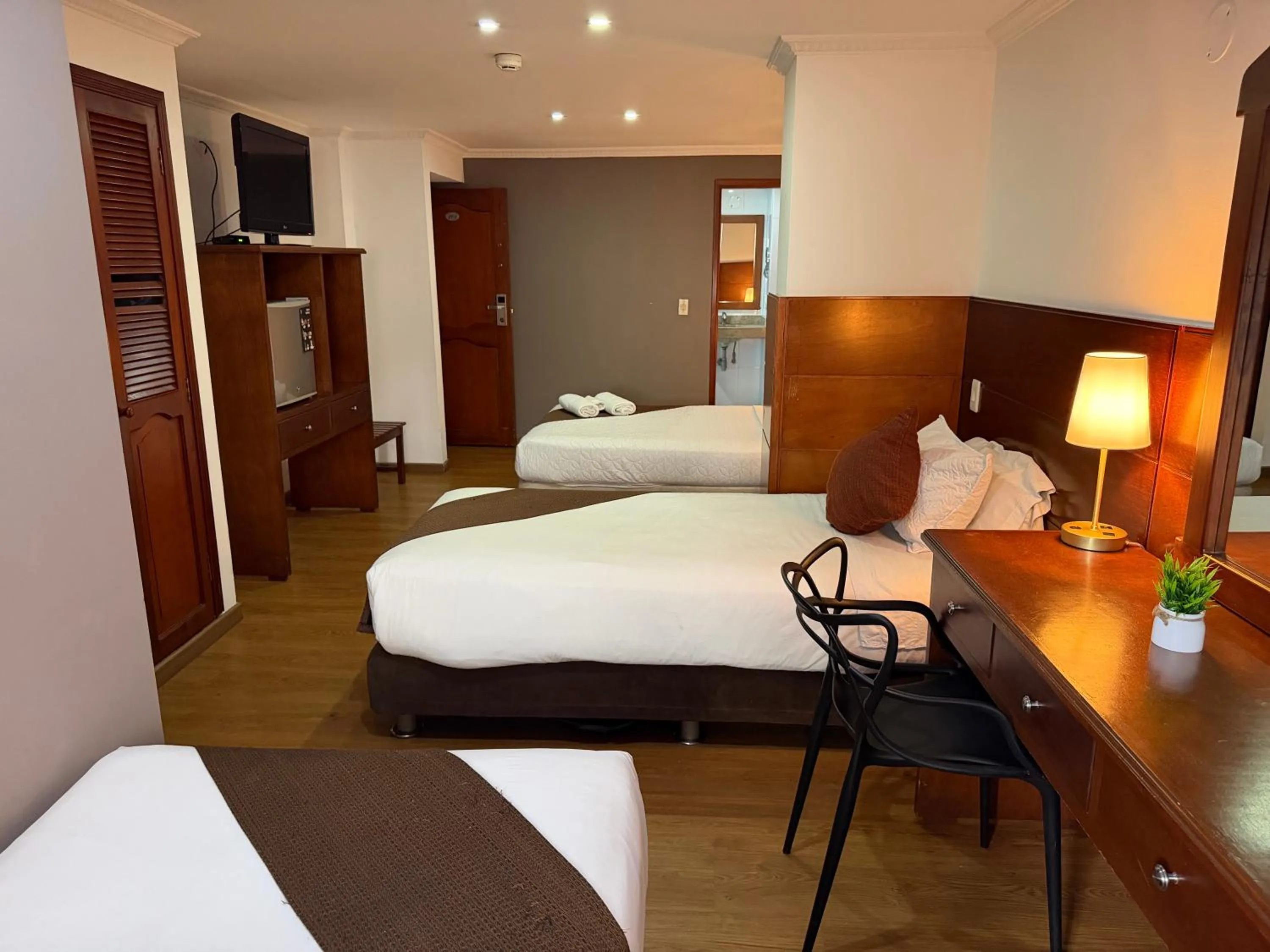 Bed in Blu Inn Hotel