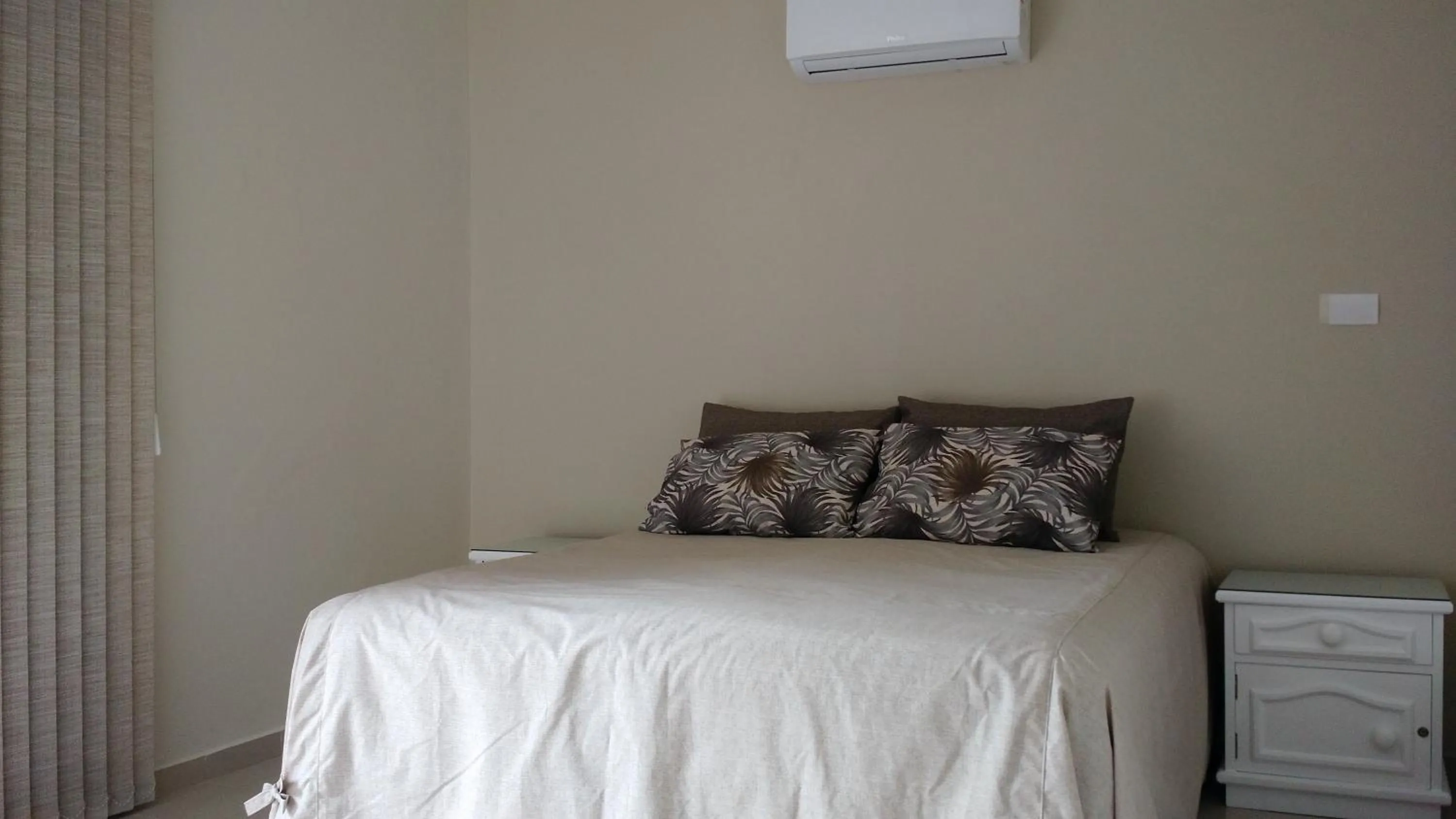 Bed in Apartamento Enseada Guarujá