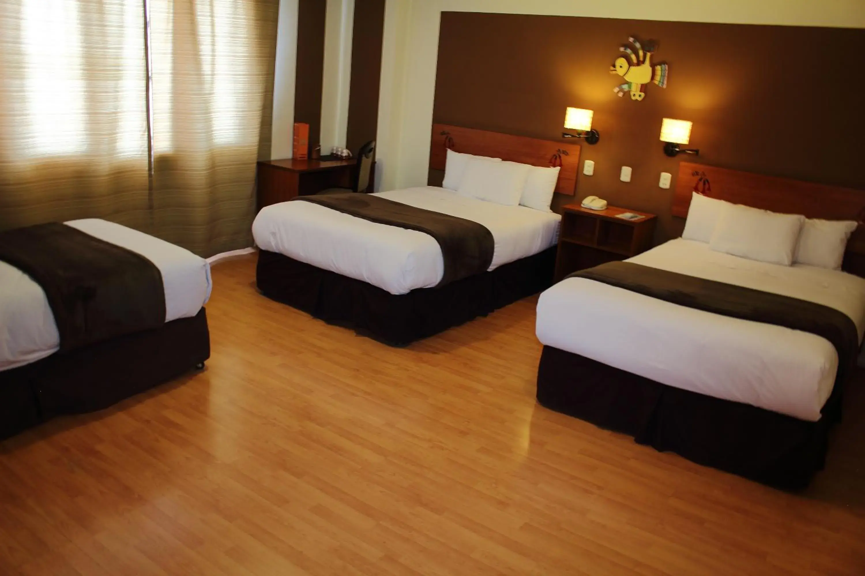 Standard Triple Room in Intiqa Hotel Standard Triple Room in Intiqa Hotel