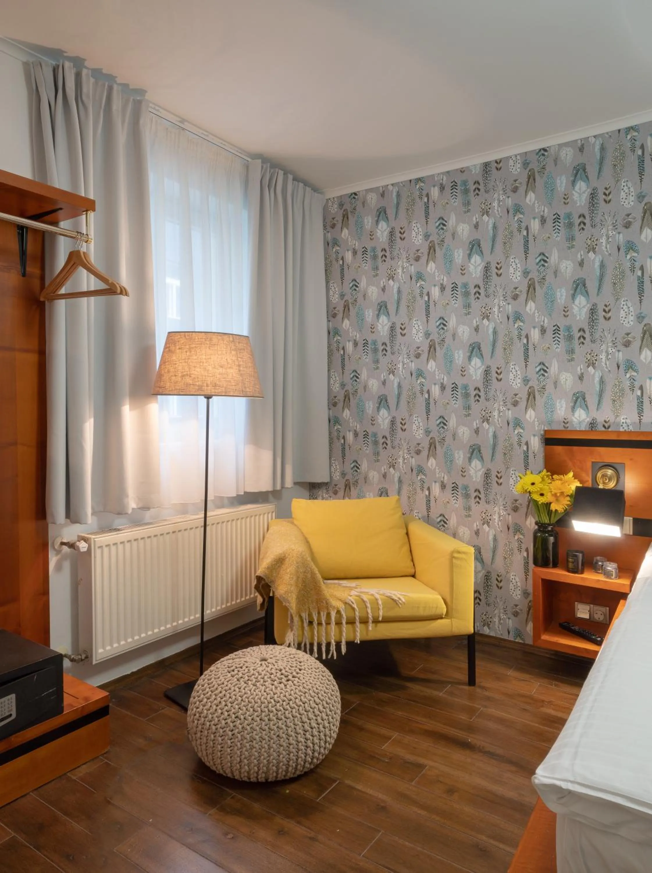 Seating area, Bed in 4 Elements Apartments