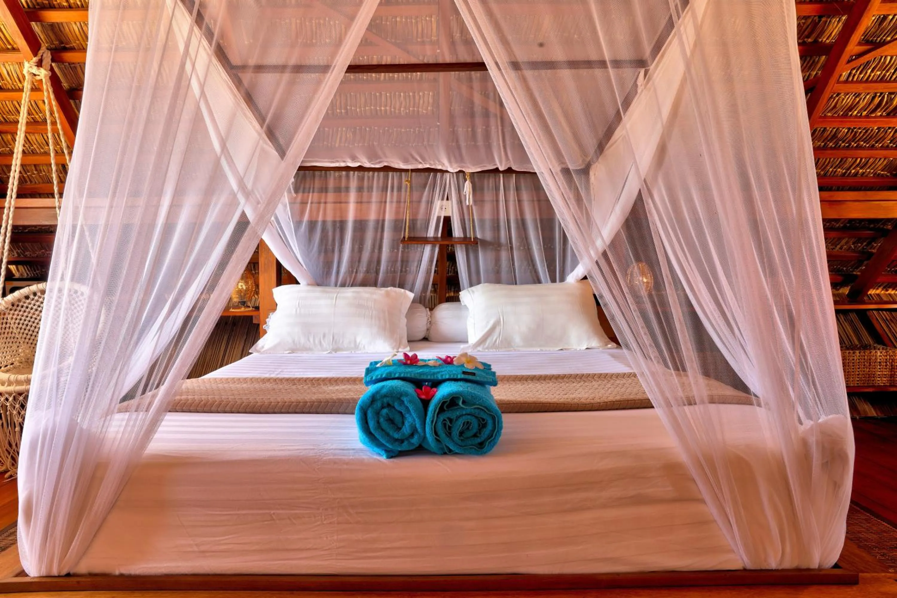 Bed in Loedi Bungalows Rote