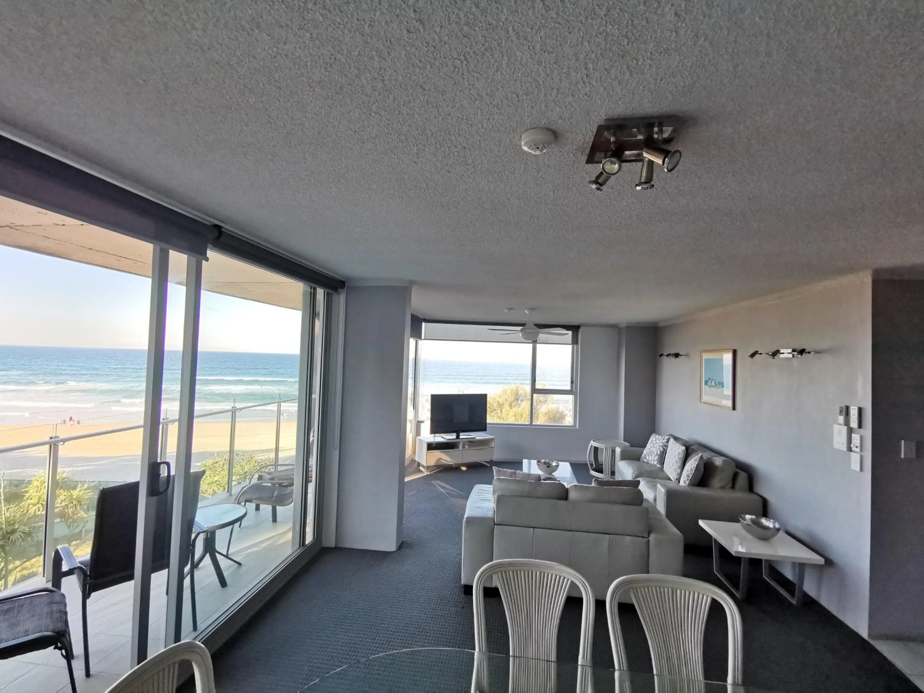 Communal lounge/ TV room in One The Esplanade Apartments on Surfers Paradise