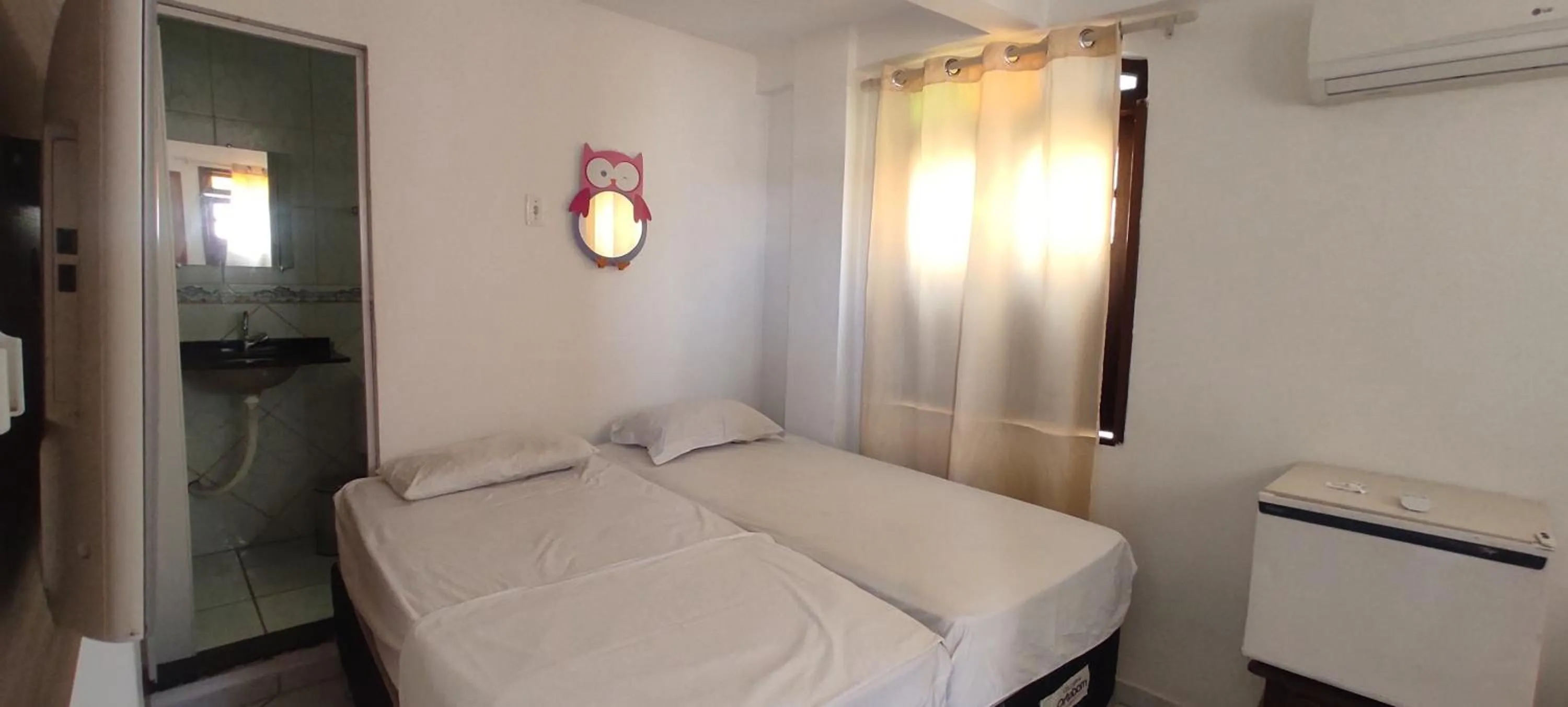 Bed in Pousada Zumbi dos Palmares