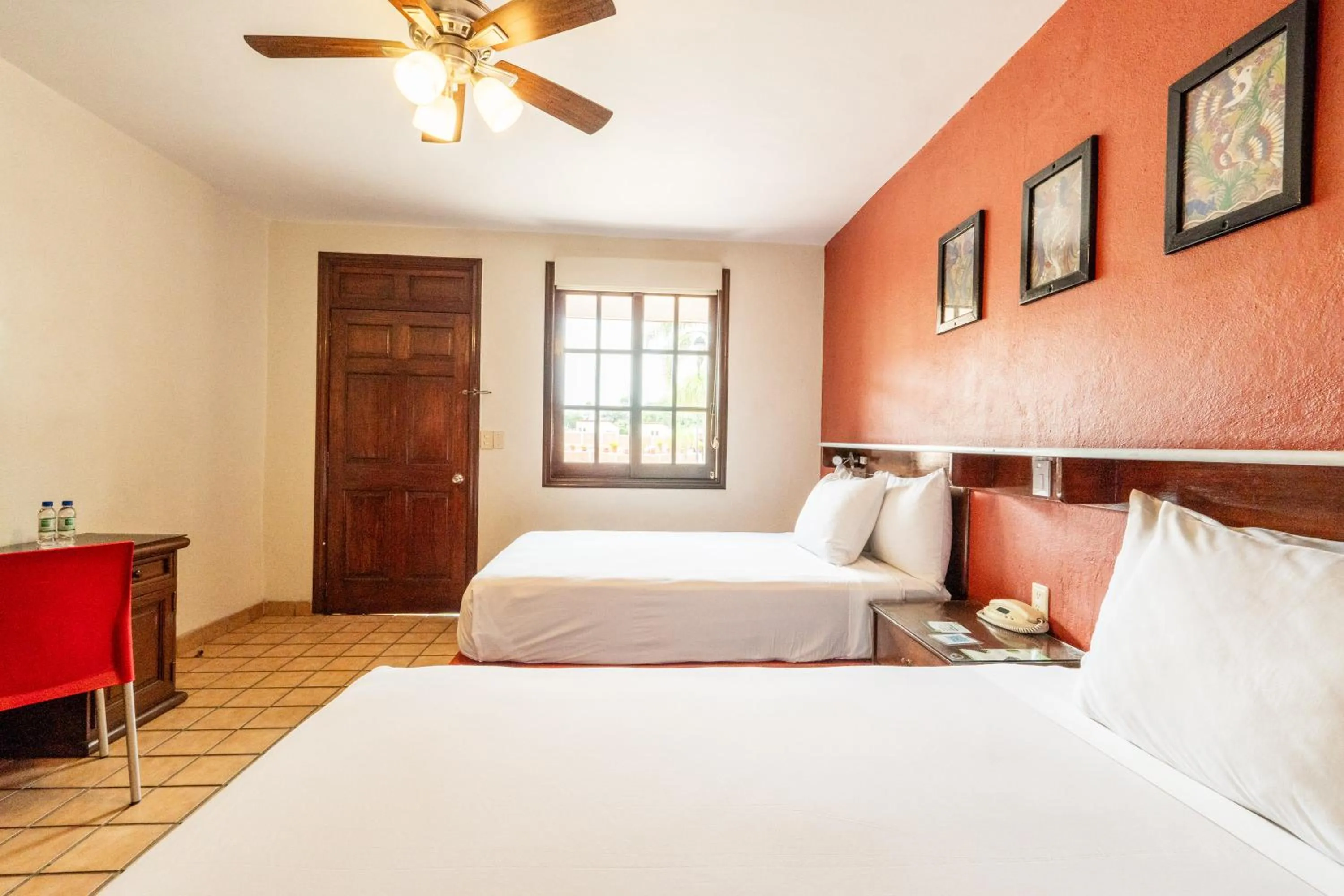 Bed in Villas del Sol Hotel & Bungalows