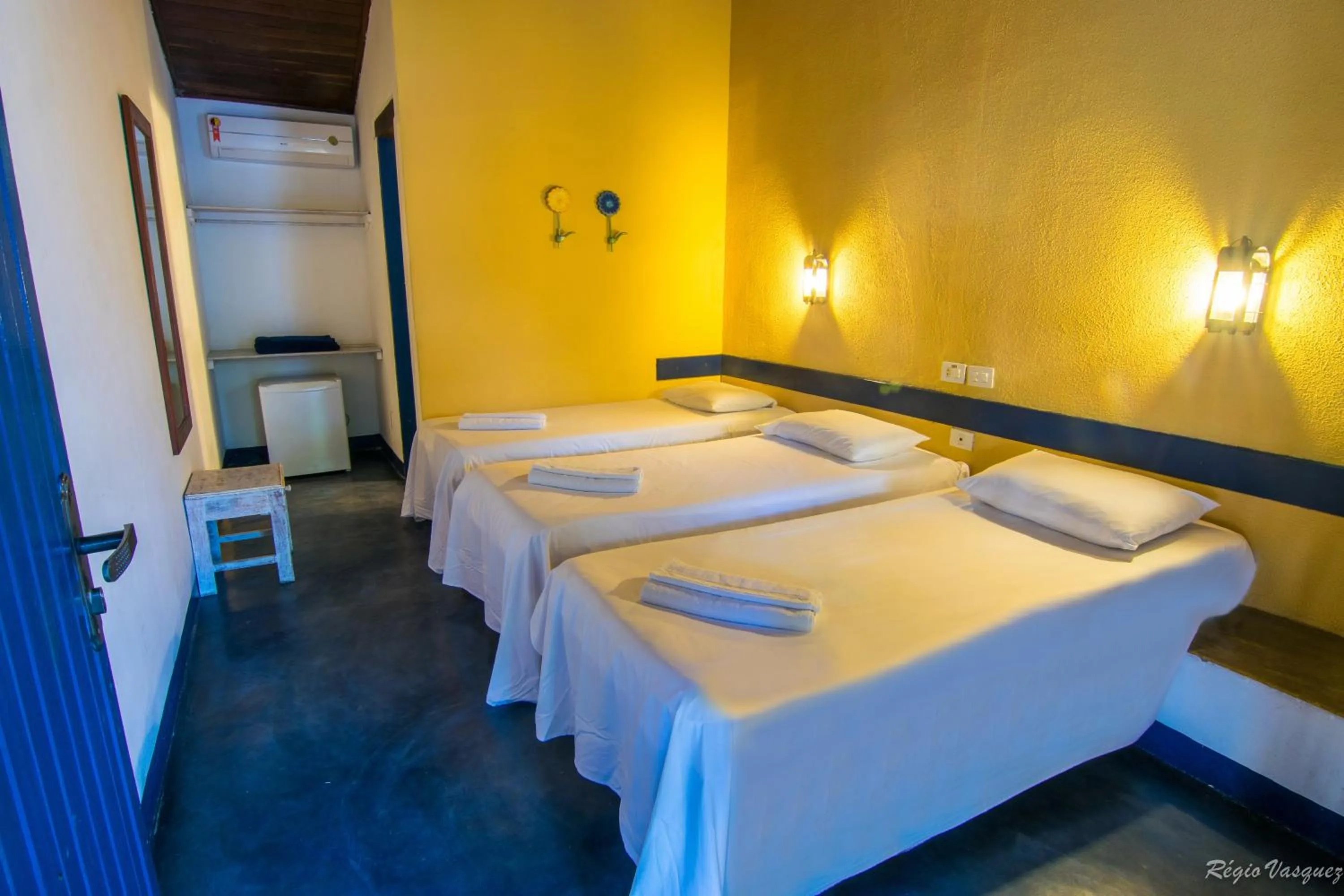 Bed in Pousada Sao Luiz