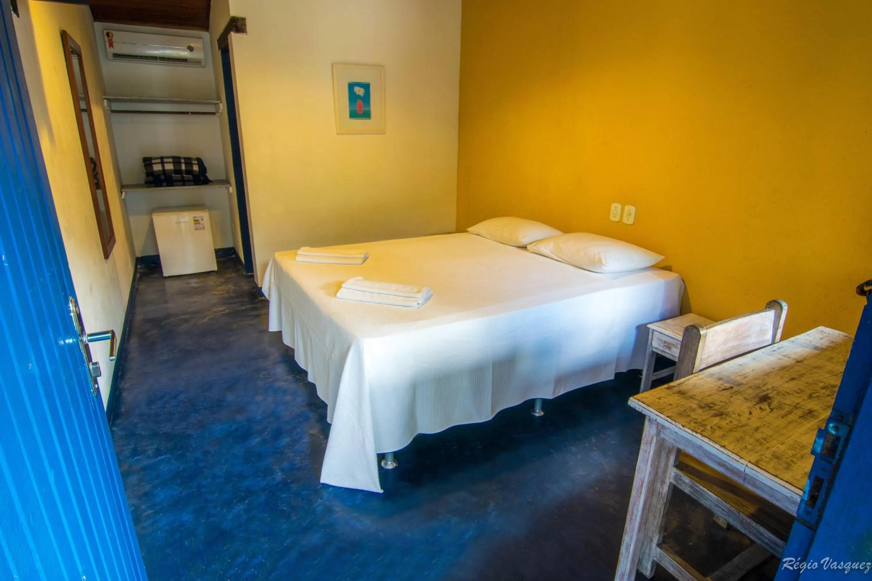 Bed in Pousada Sao Luiz