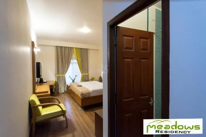 Bed in Meadows Residency