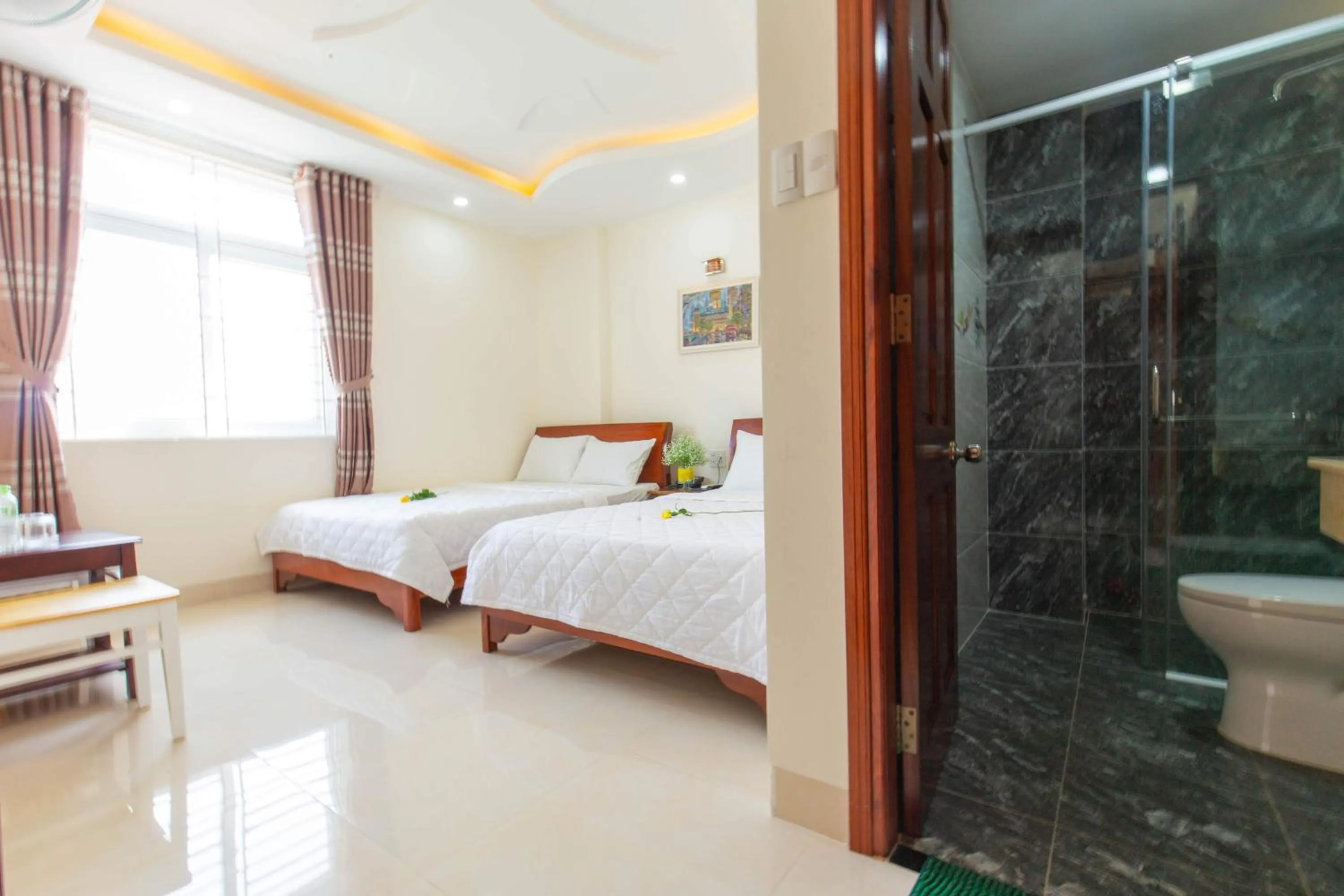Photo of the whole room, Bed in Biển Ngọc Hotel