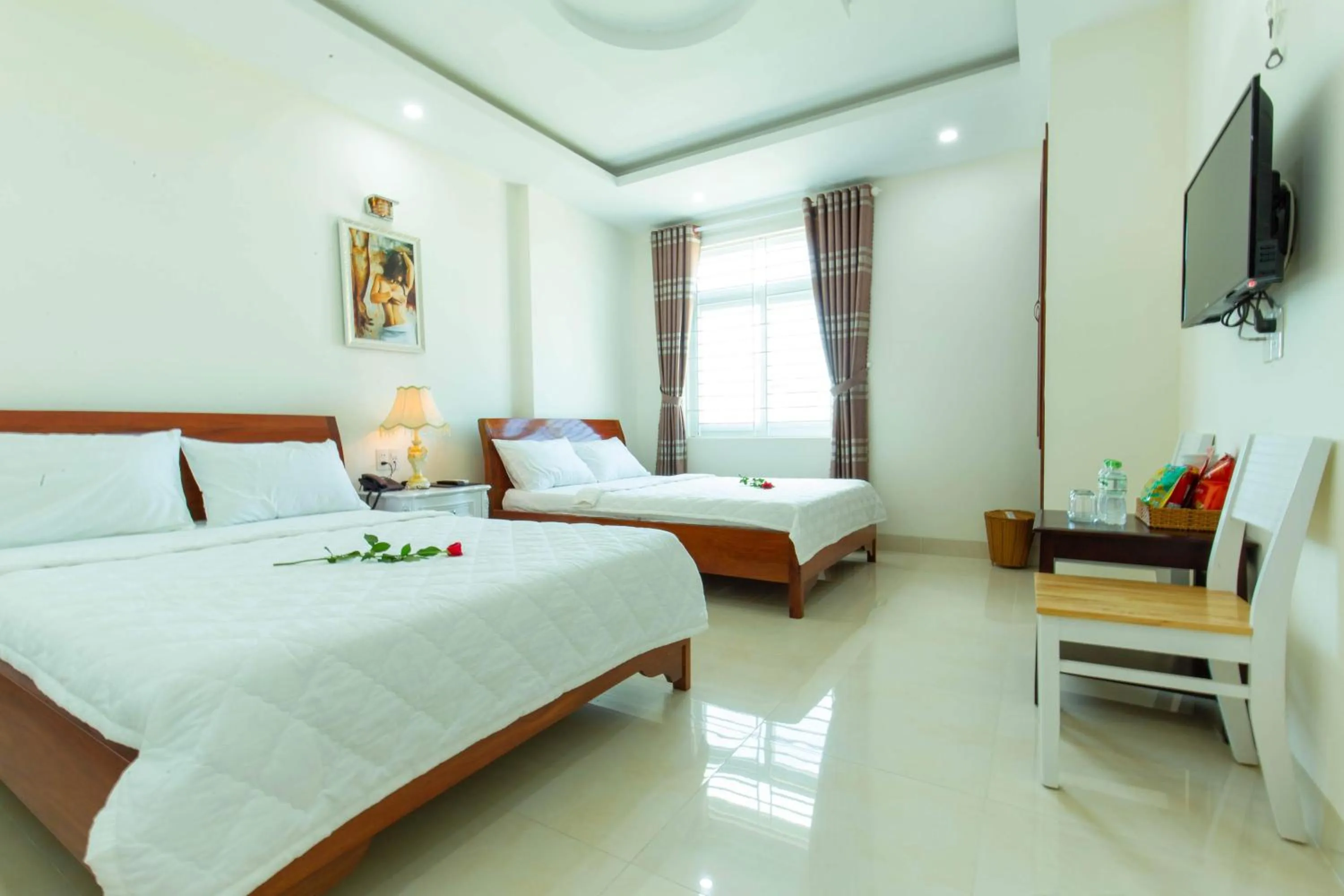 Photo of the whole room, Bed in Biển Ngọc Hotel