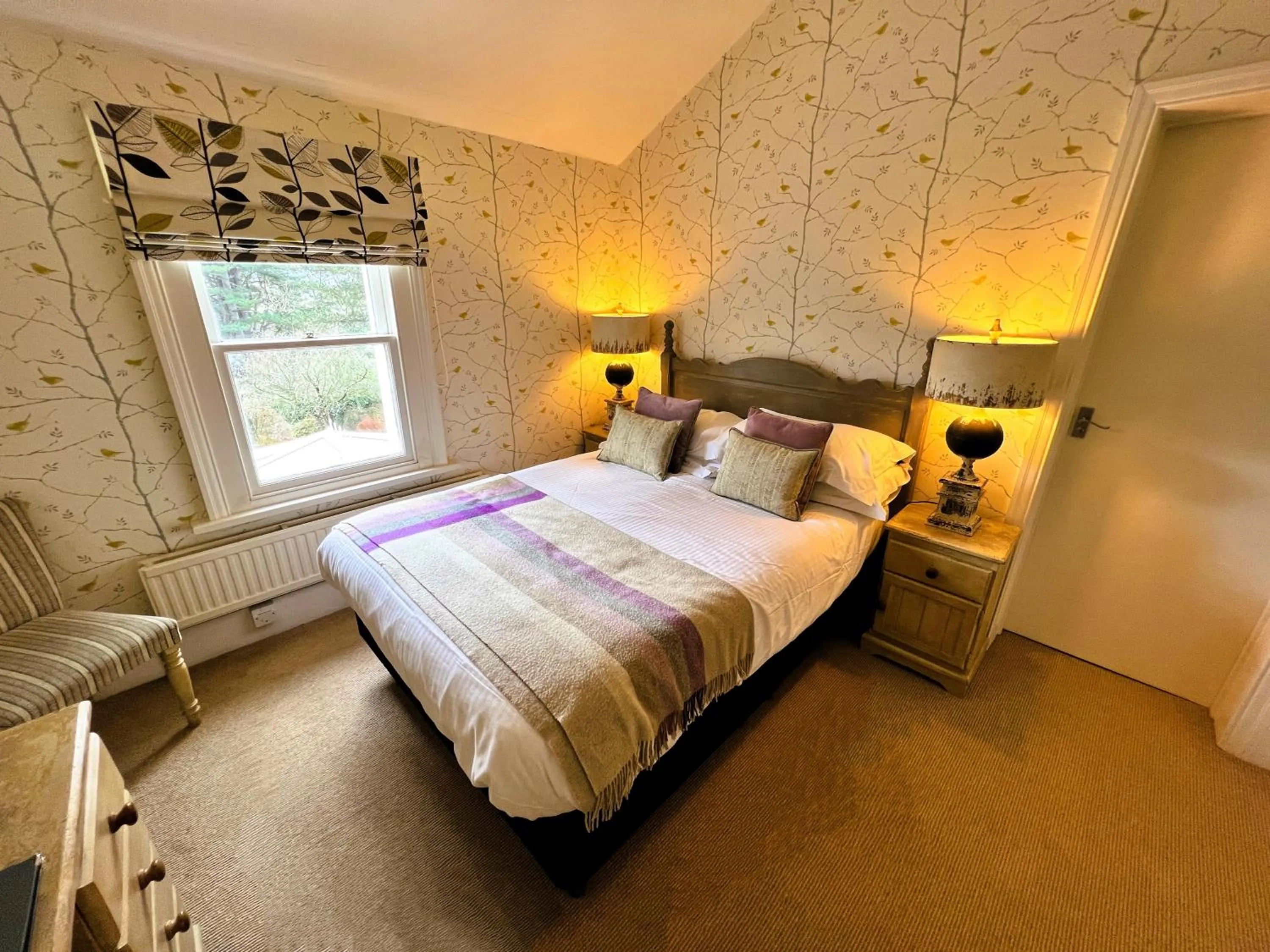 Bedroom, Bed in Ravenstone Lodge Country House Hotel