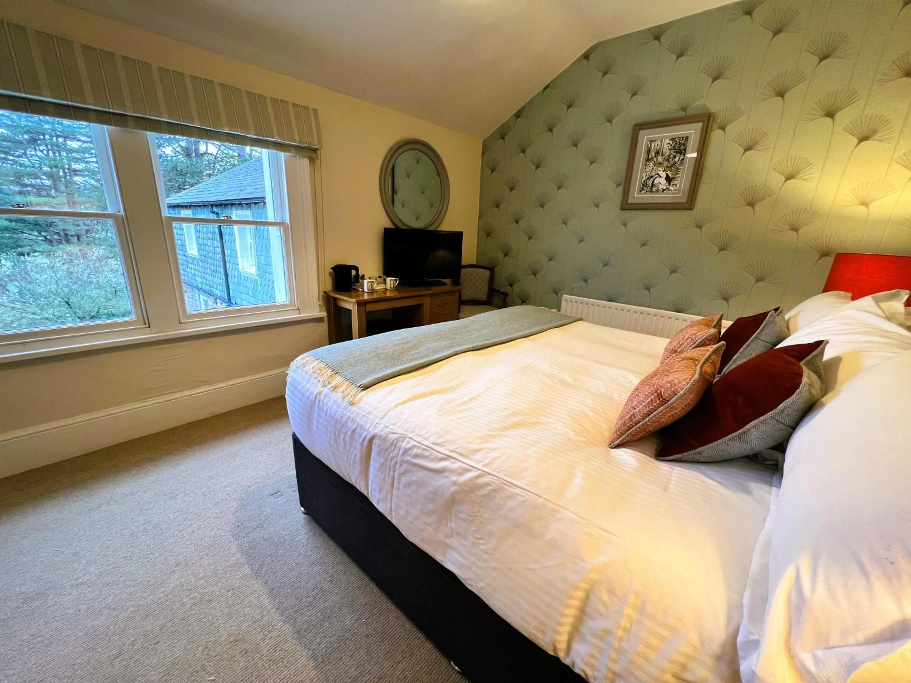 Bedroom, Bed in Ravenstone Lodge Country House Hotel