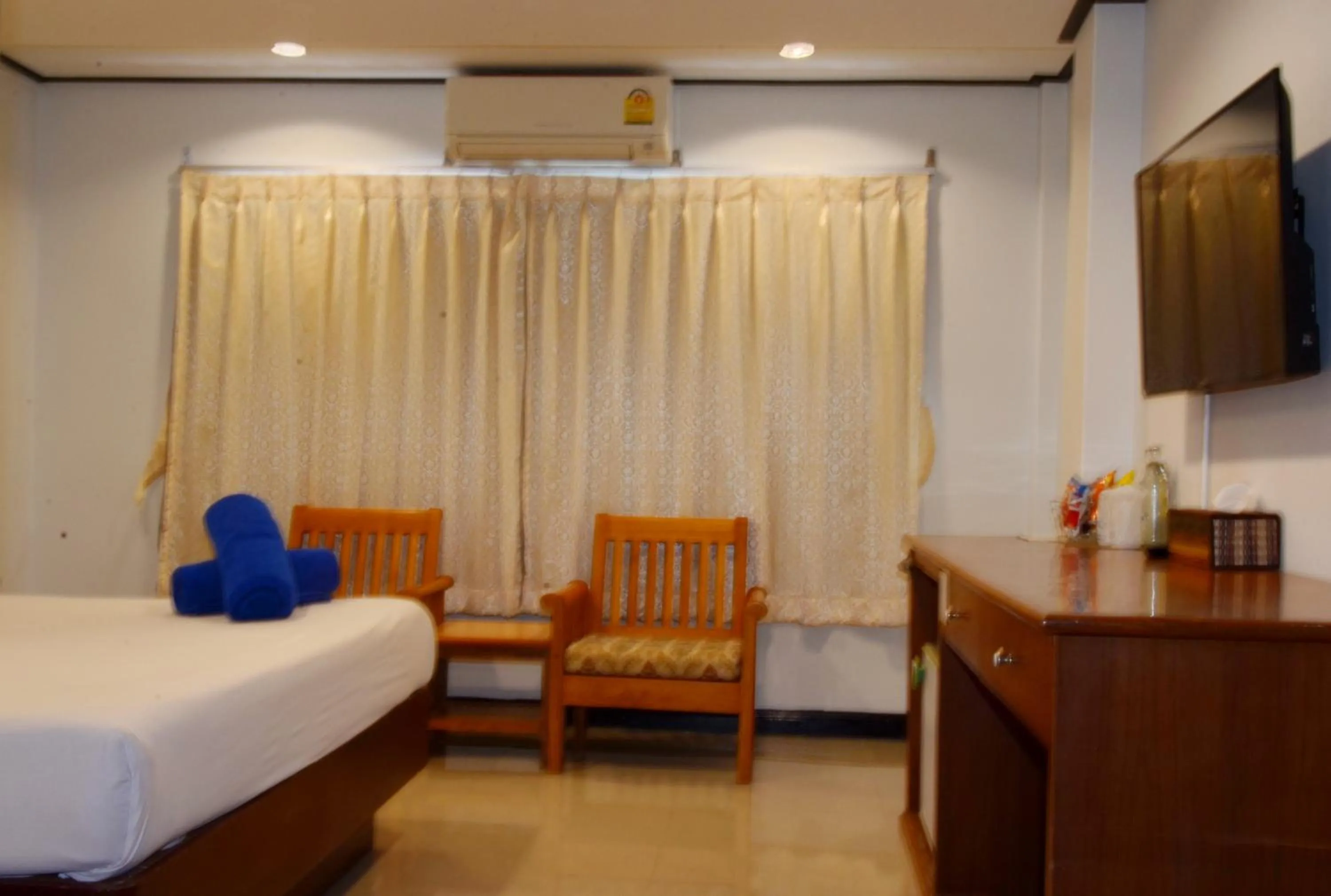 Photo of the whole room, Bed in At Bangkok Hotel