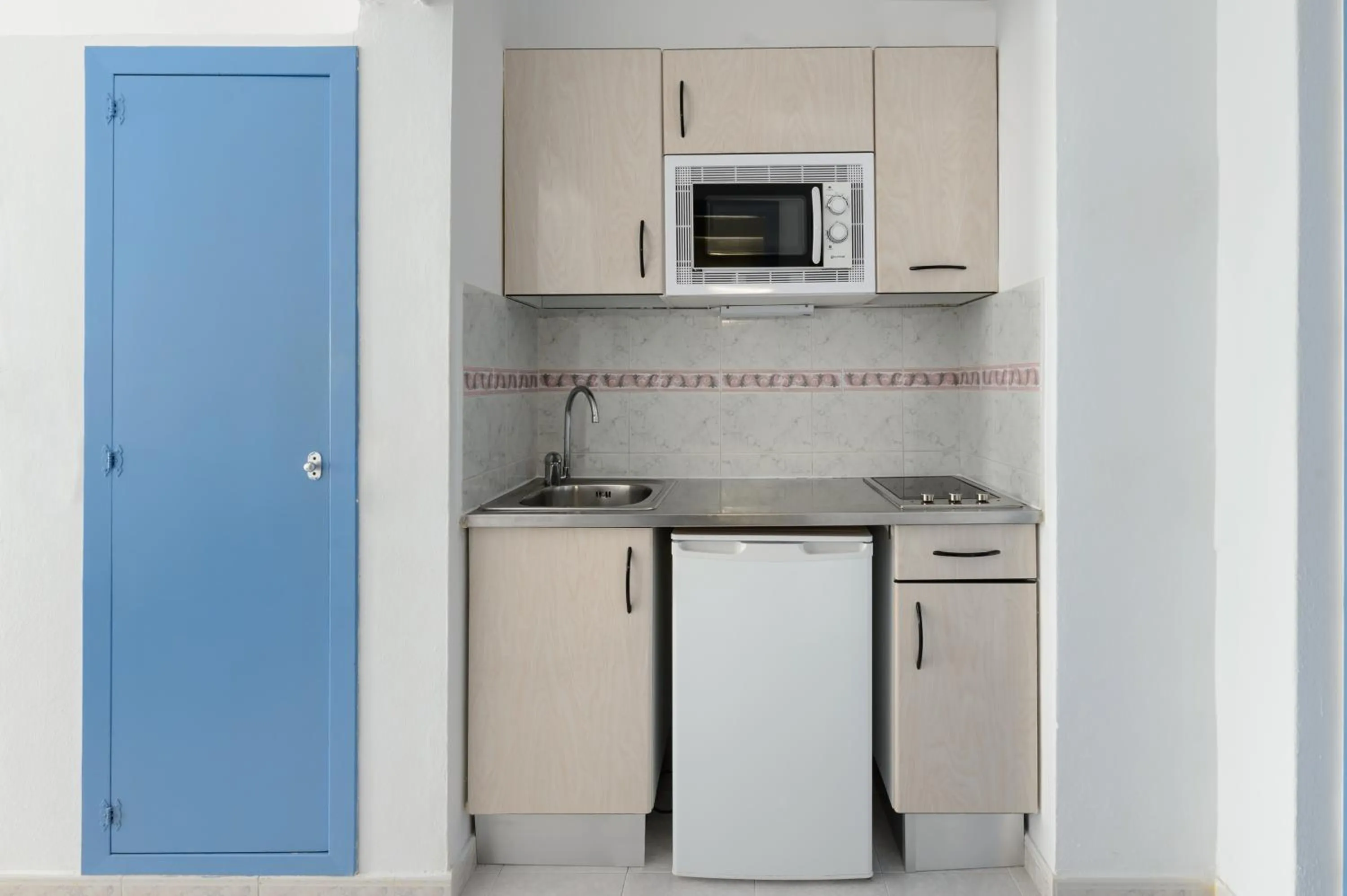 Kitchen or kitchenette in Hotel Apartamentos Vibra Central City - Adults only