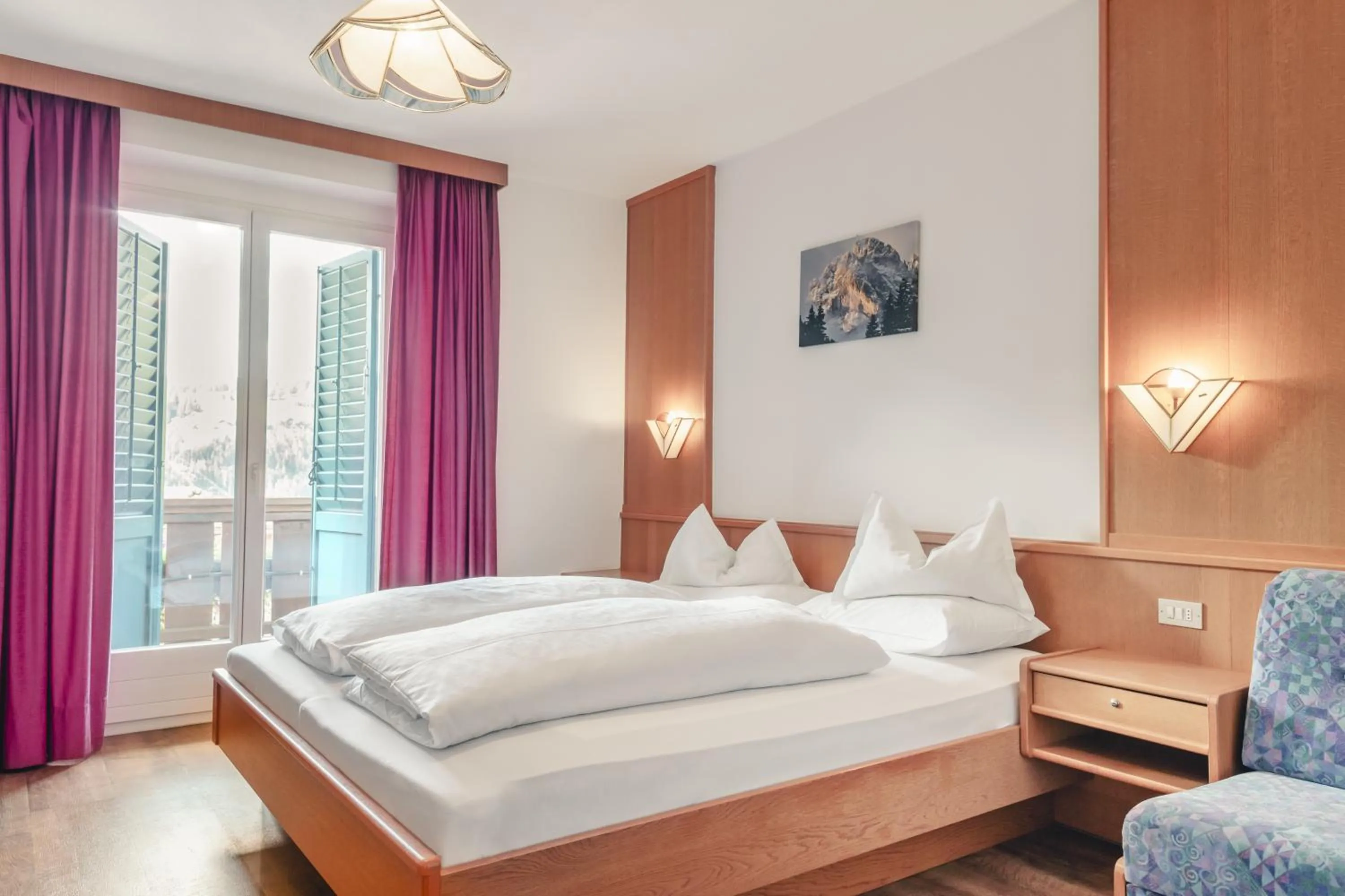 Bed in Kristiania Small Dolomites Hotel