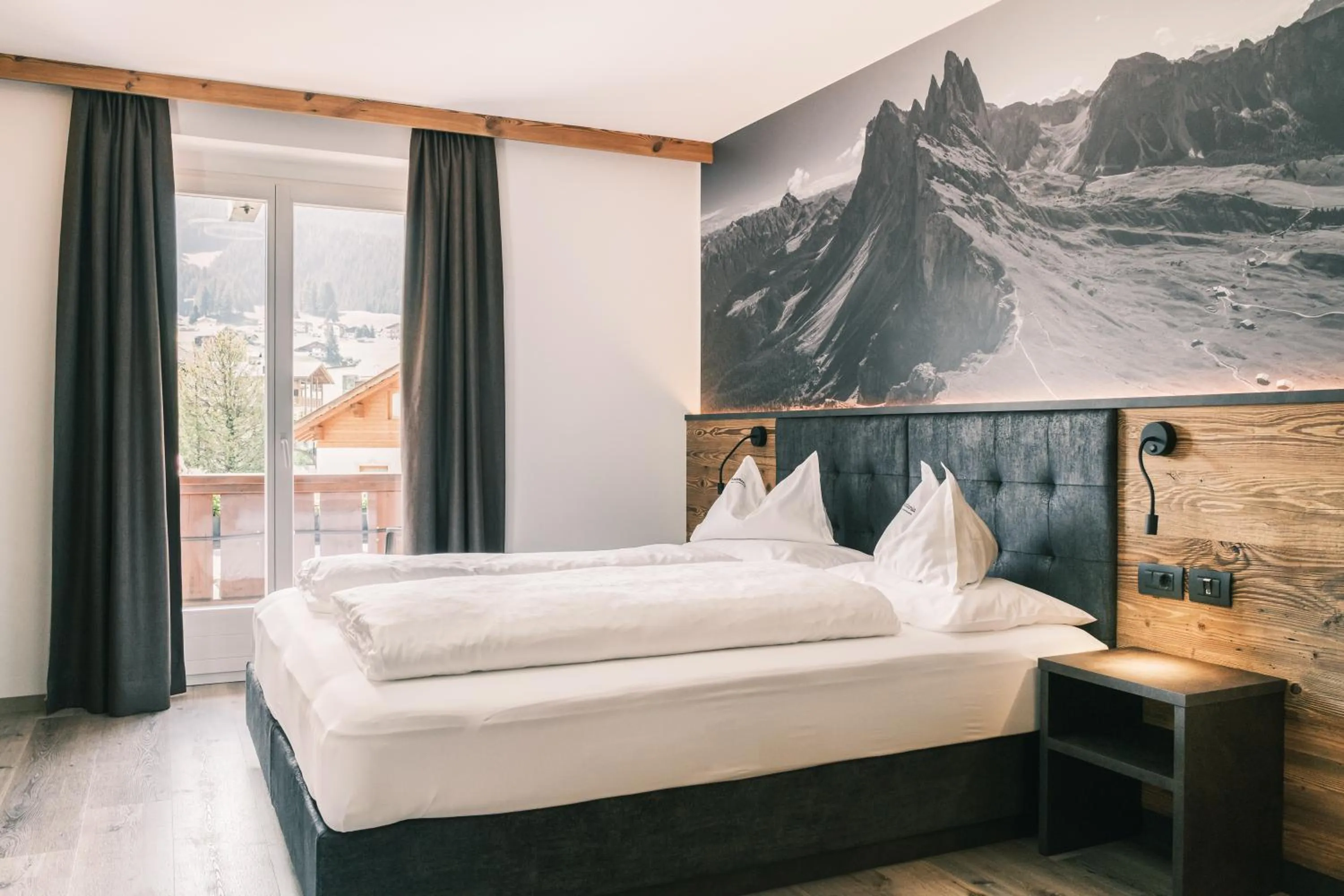 Bed in Kristiania Small Dolomites Hotel