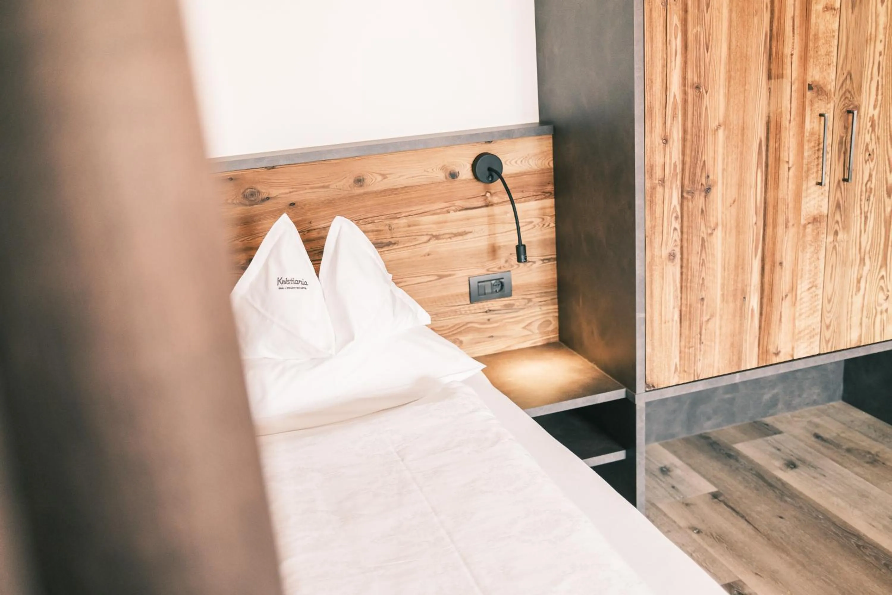 Bed in Kristiania Small Dolomites Hotel