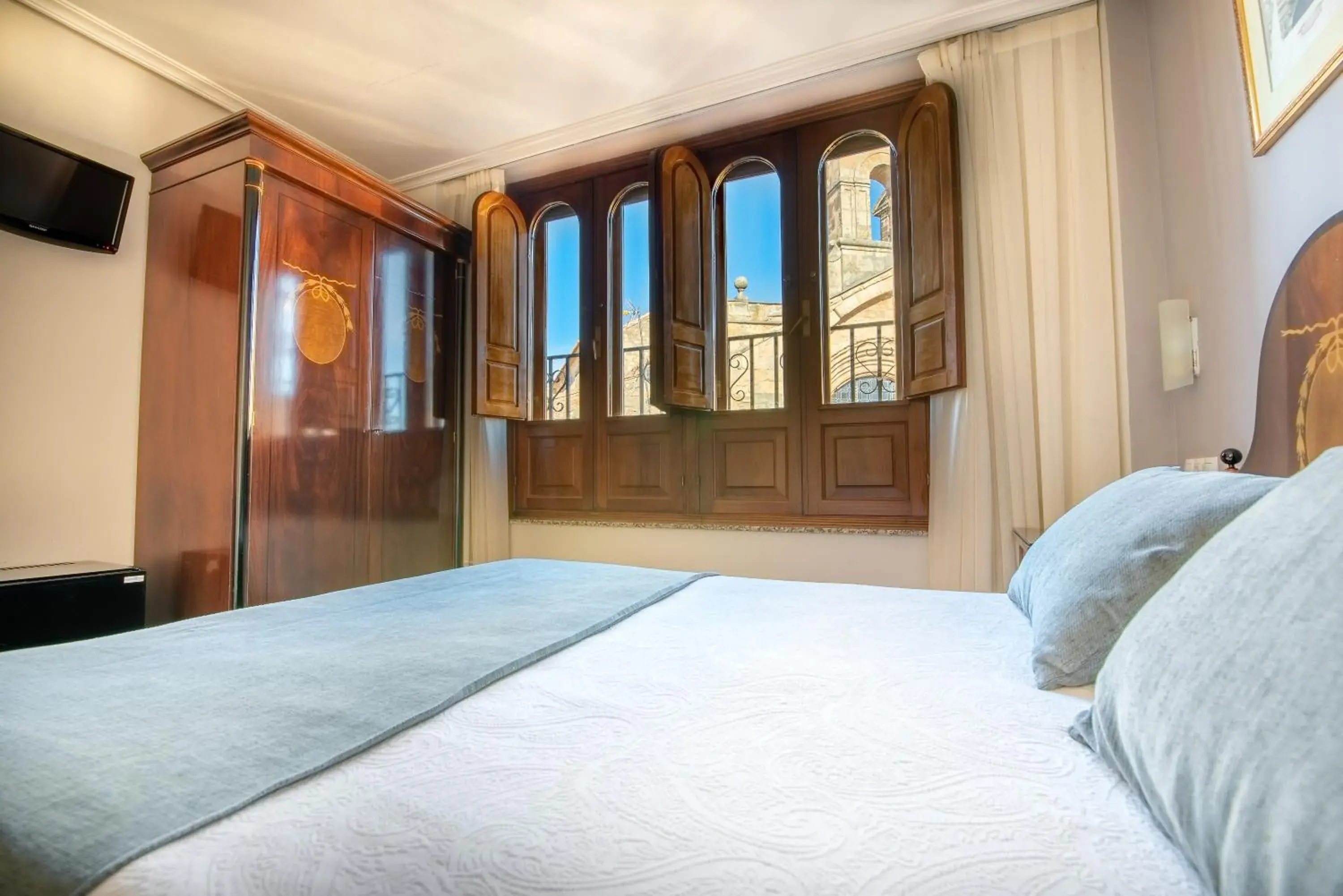 Photo of the whole room, Bed in Hospedium Plaza Mayor Salamanca Photo of the whole room, Bed in Hospedium Plaza Mayor Salamanca