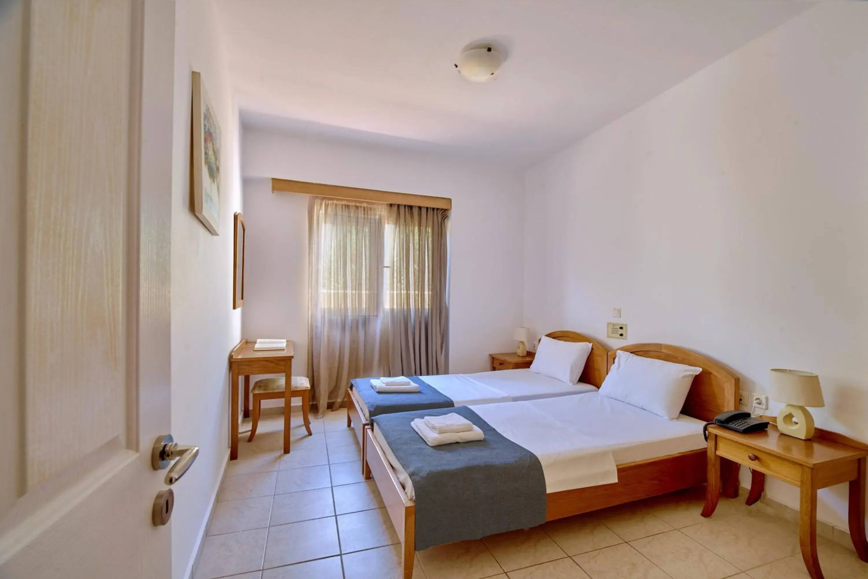 Bed in Veronica Hotel Bed in Veronica Hotel