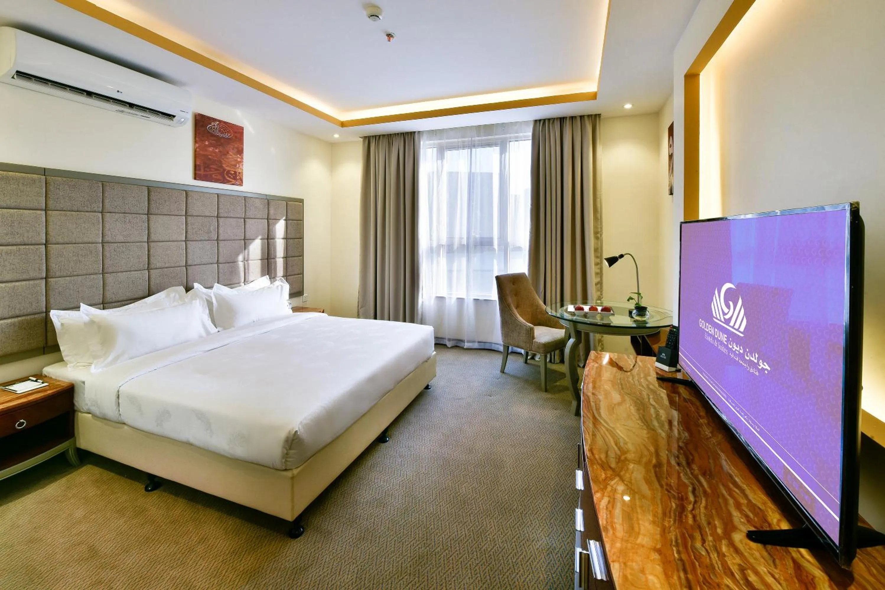 Bed in Golden Dune Hotel Turaif