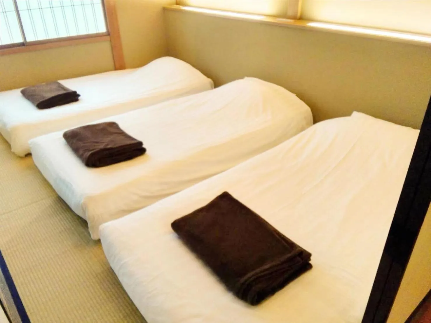 Bed in BEYOND HOTEL Takayama 1st