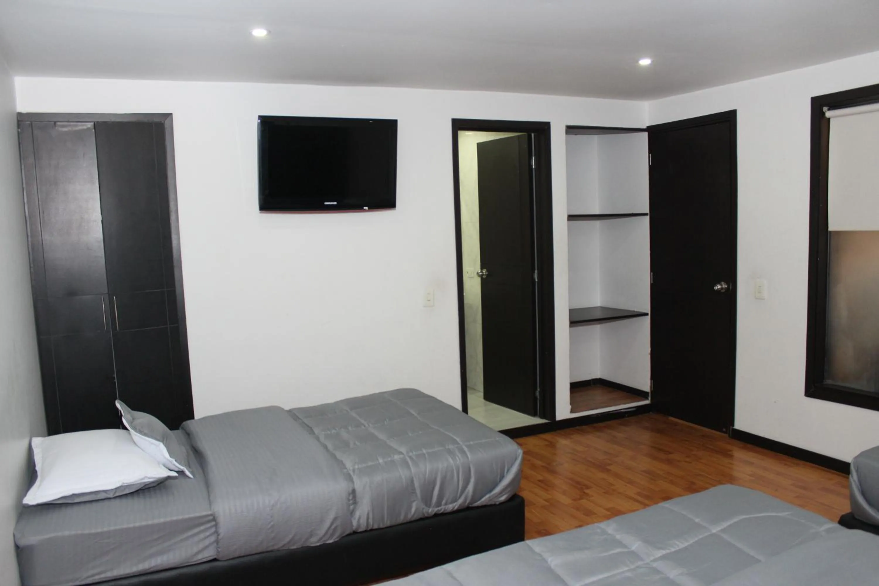 Bed in Hotel Dorado Plaza Bogota