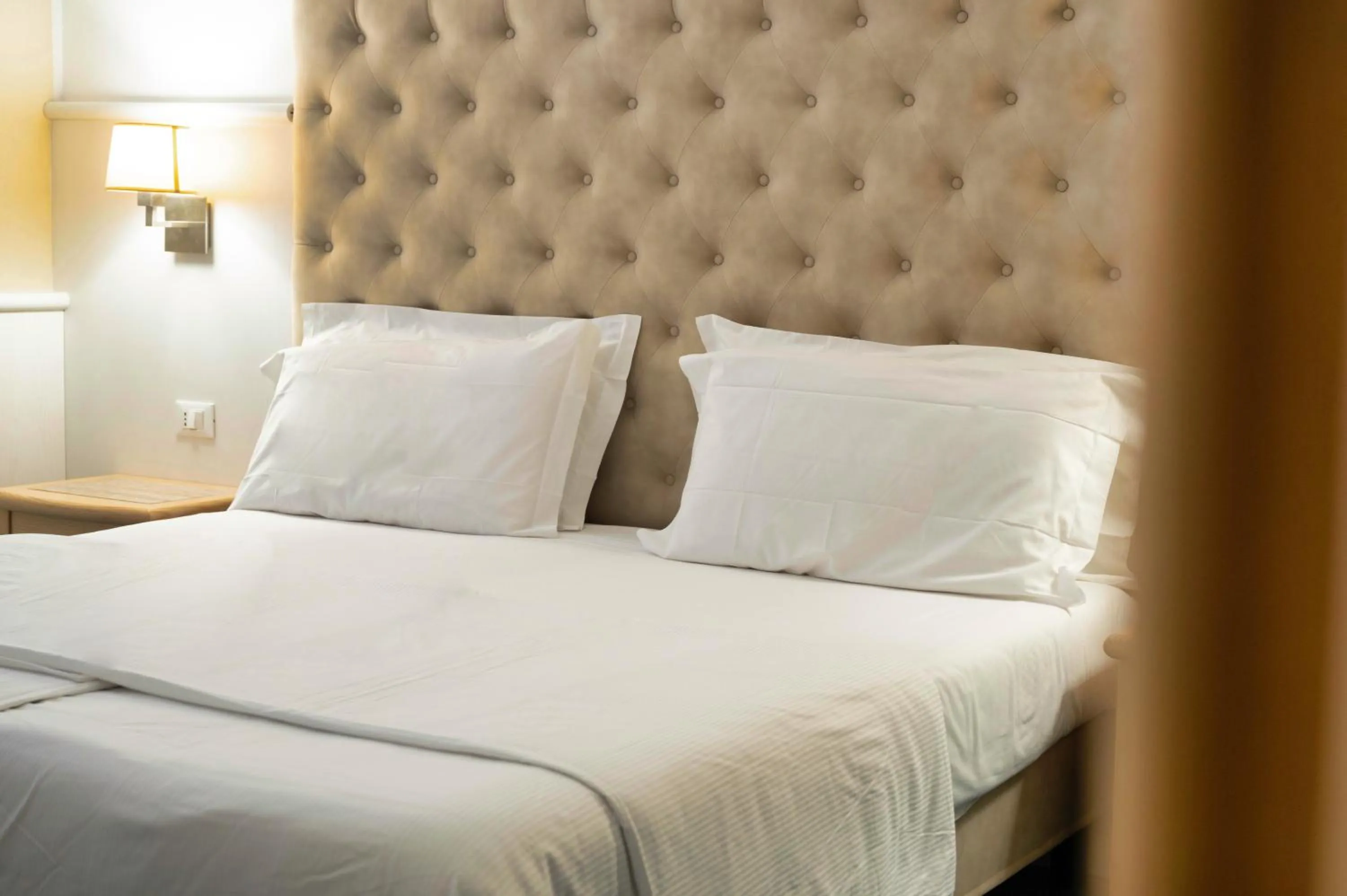 Bed in Arathena Rocks Hotel