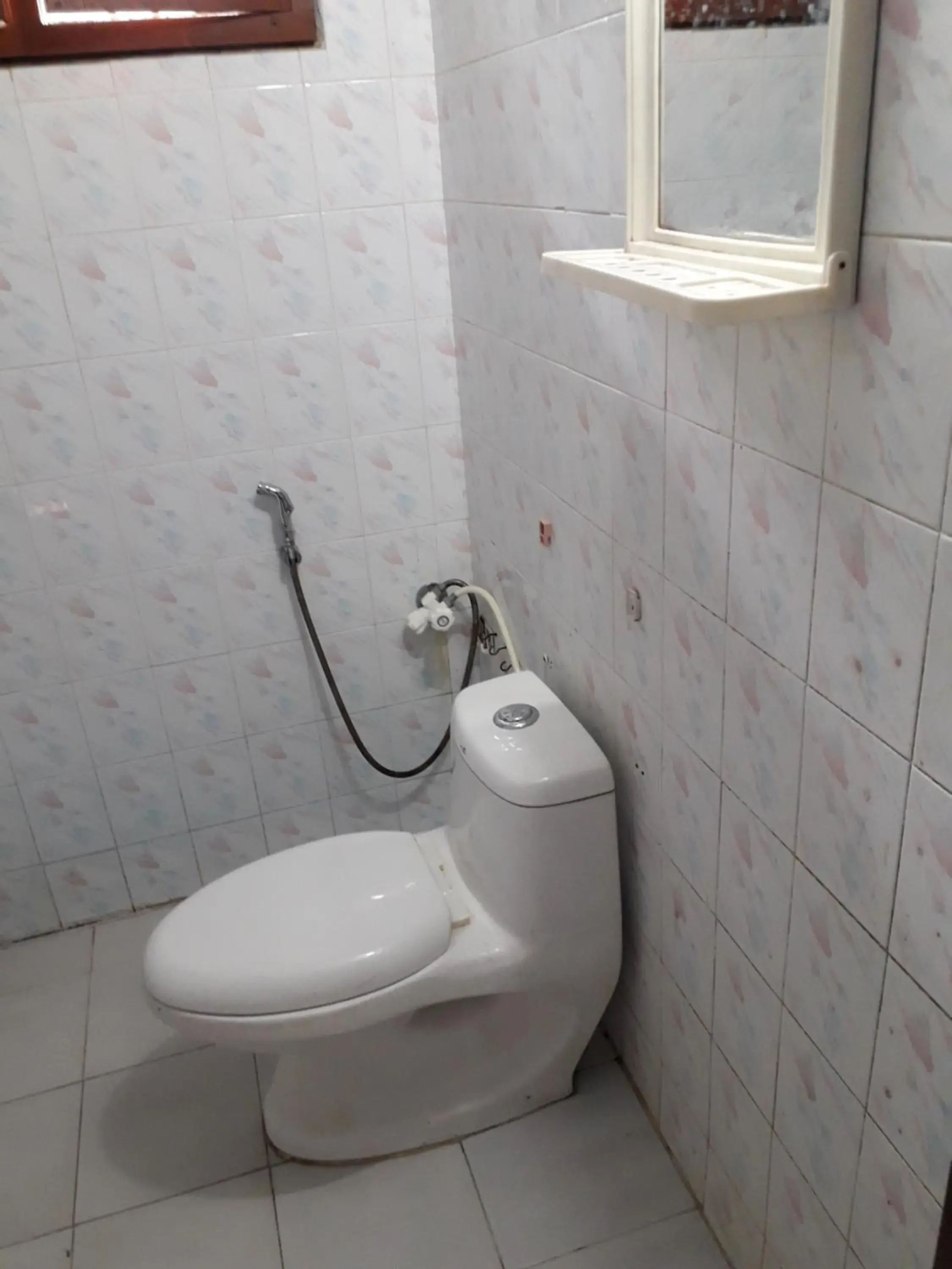 Standard Double Room with Fan in Parisha Residency- Temple Side Hotel Standard Double Room with Fan in Parisha Residency- Temple Side Hotel