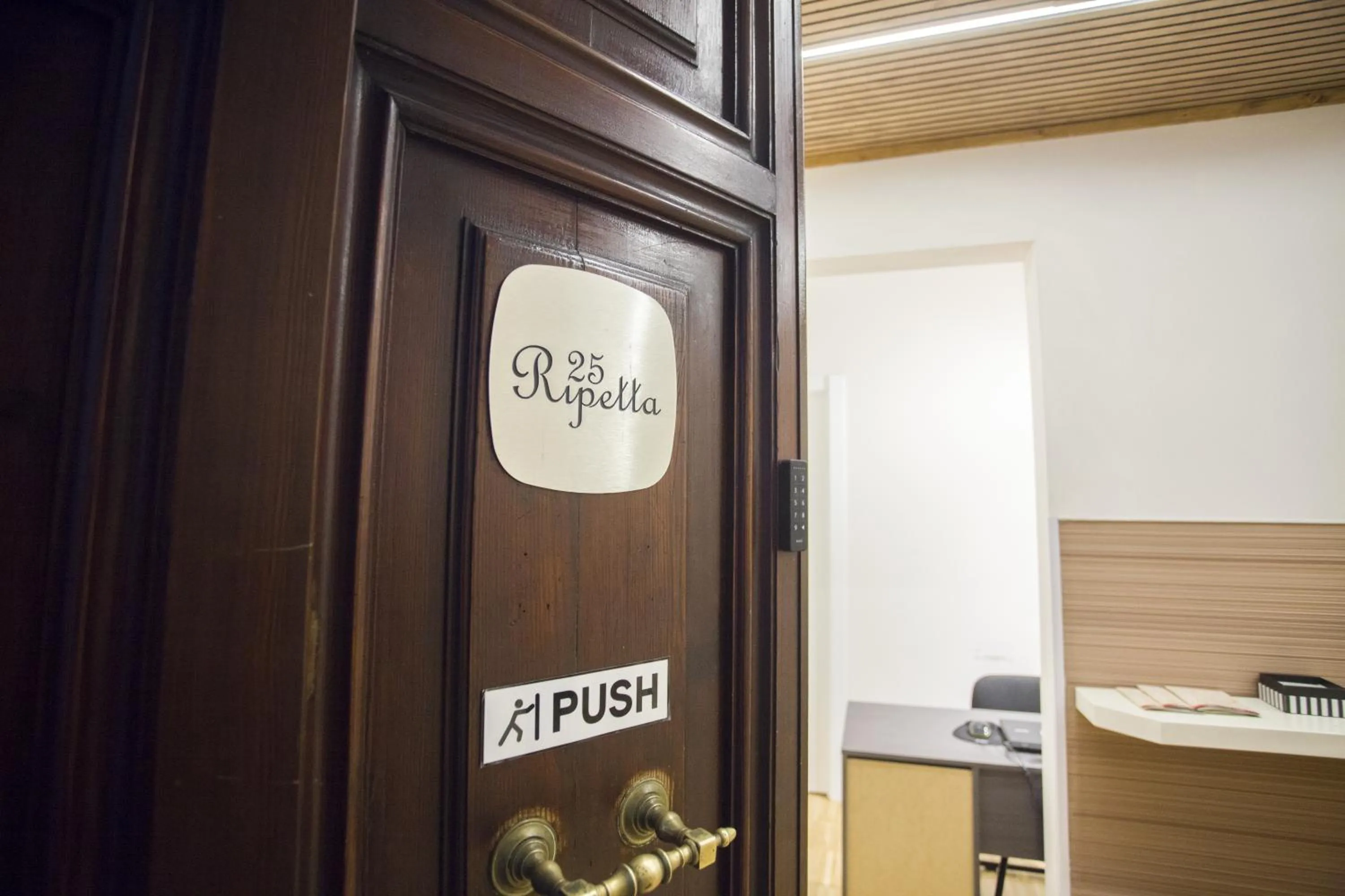 Property logo or sign in Ripetta 25 Prestige Rooms