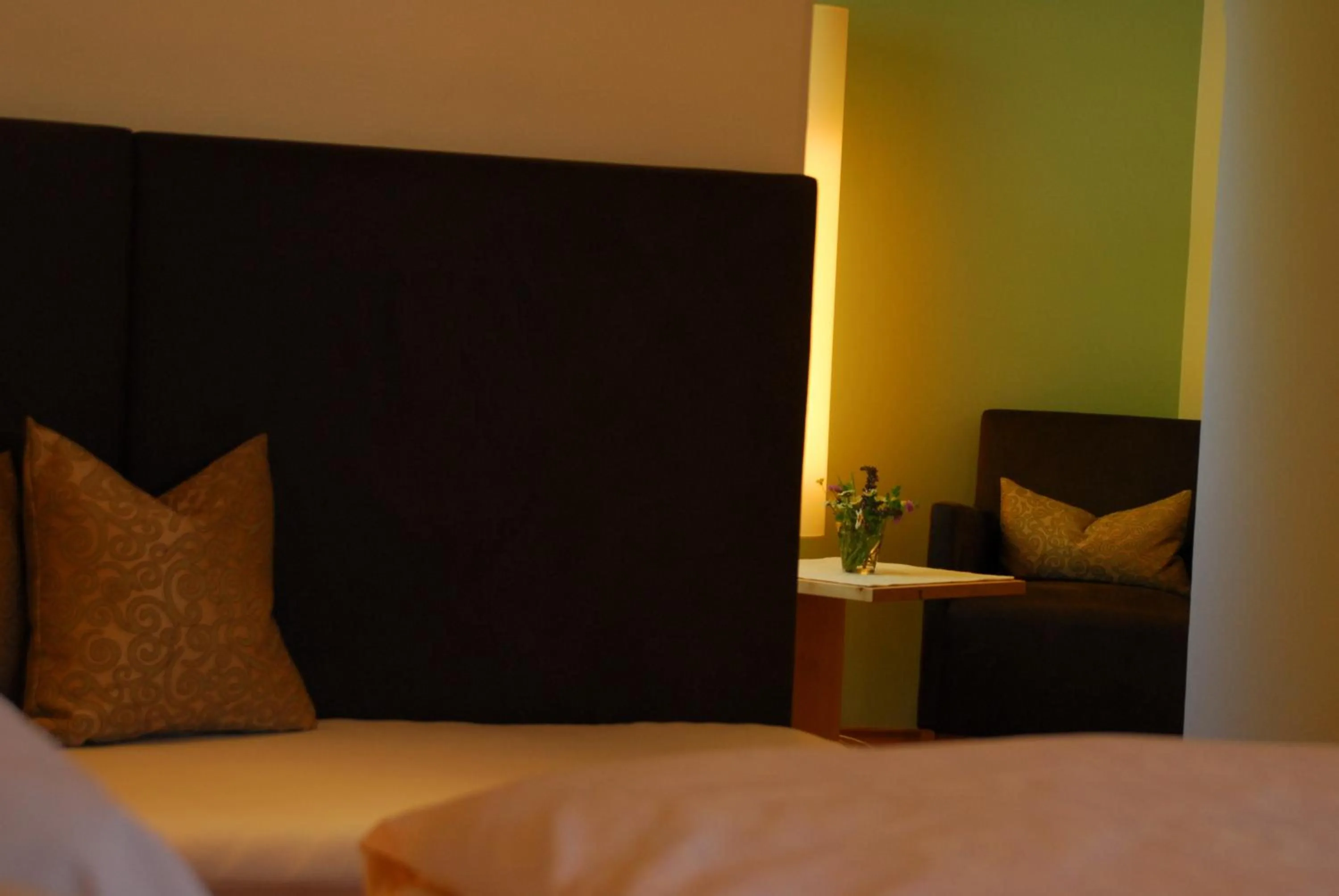 Bed in Hotel Dolomiten