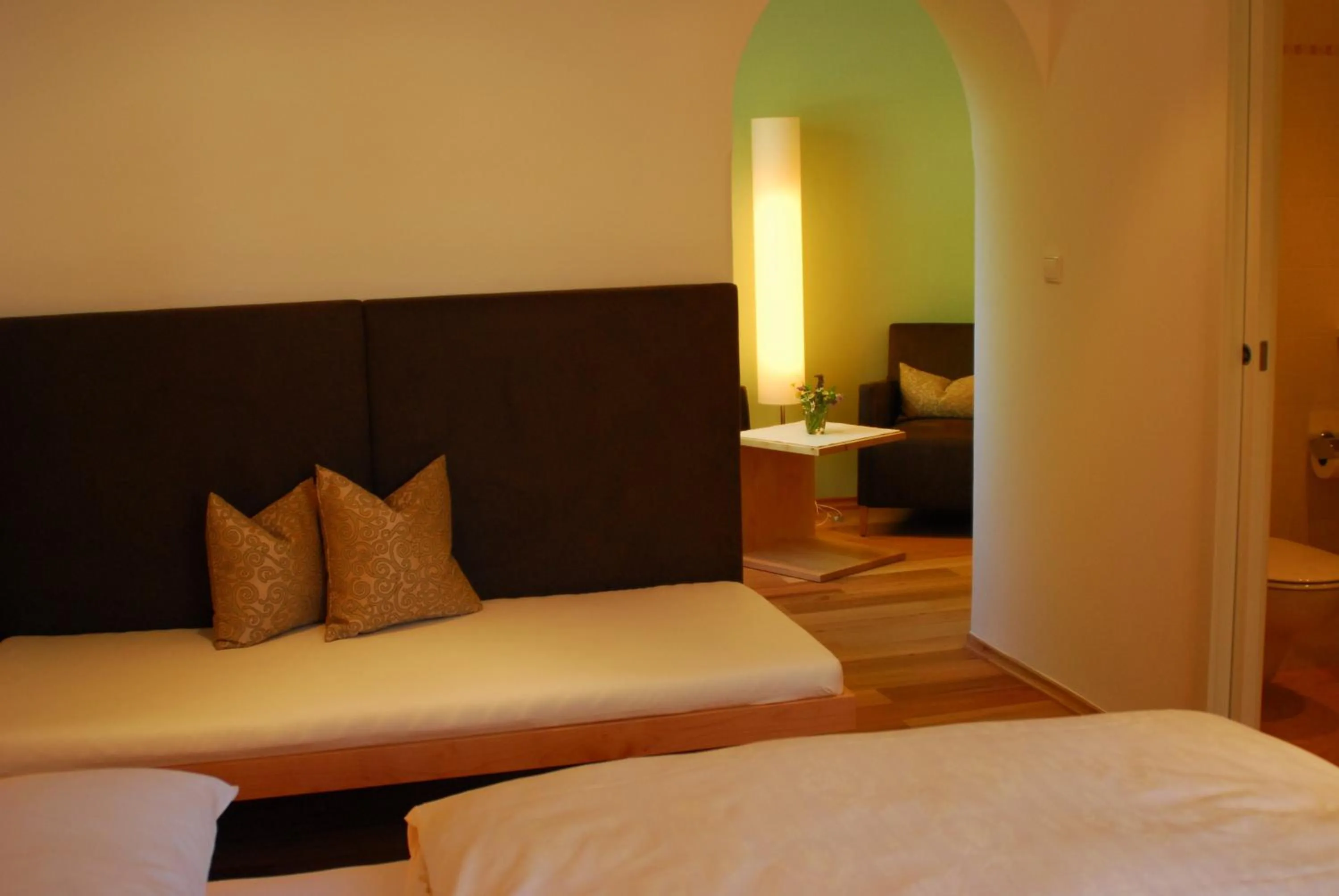 Bed in Hotel Dolomiten