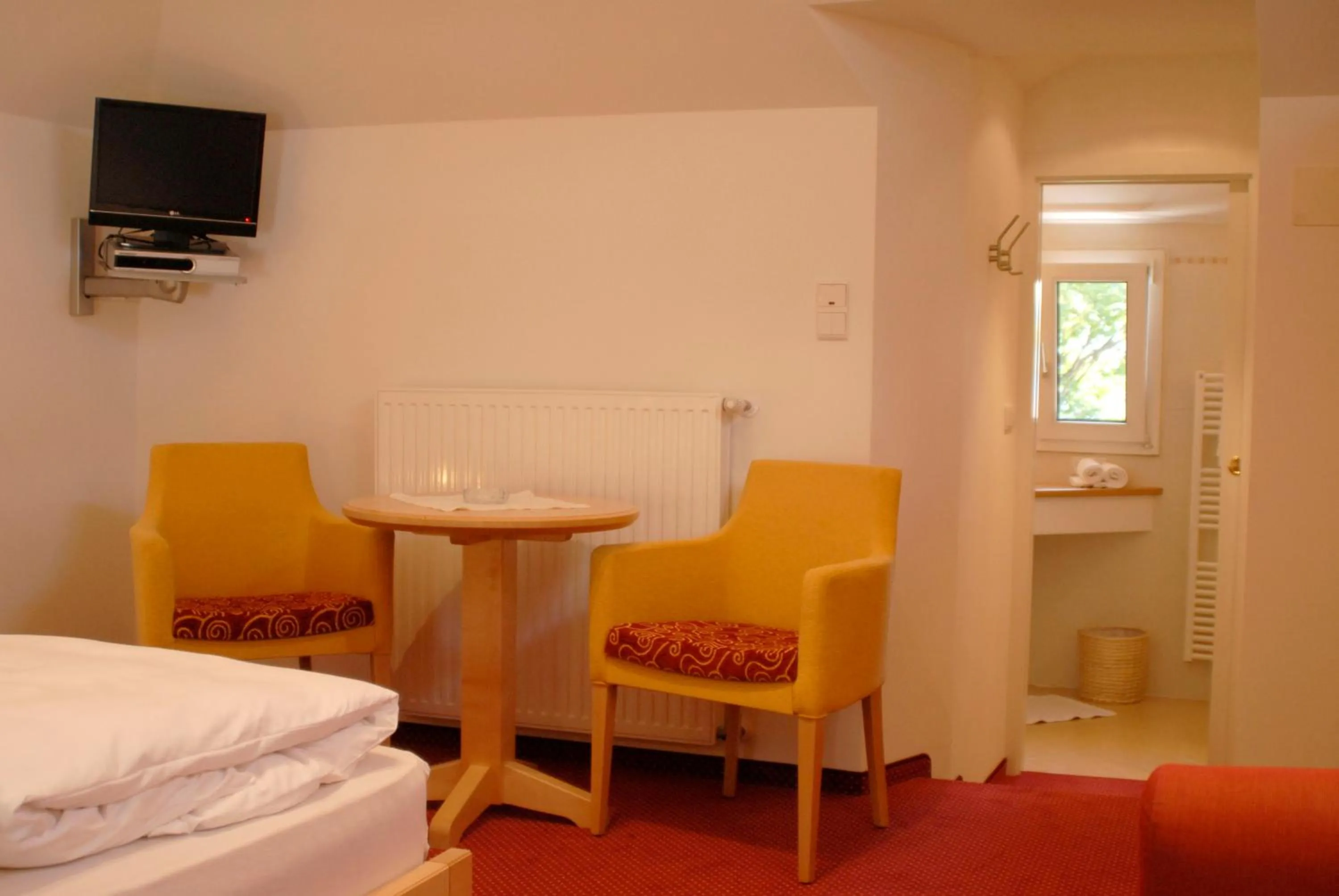 Bed in Hotel Dolomiten