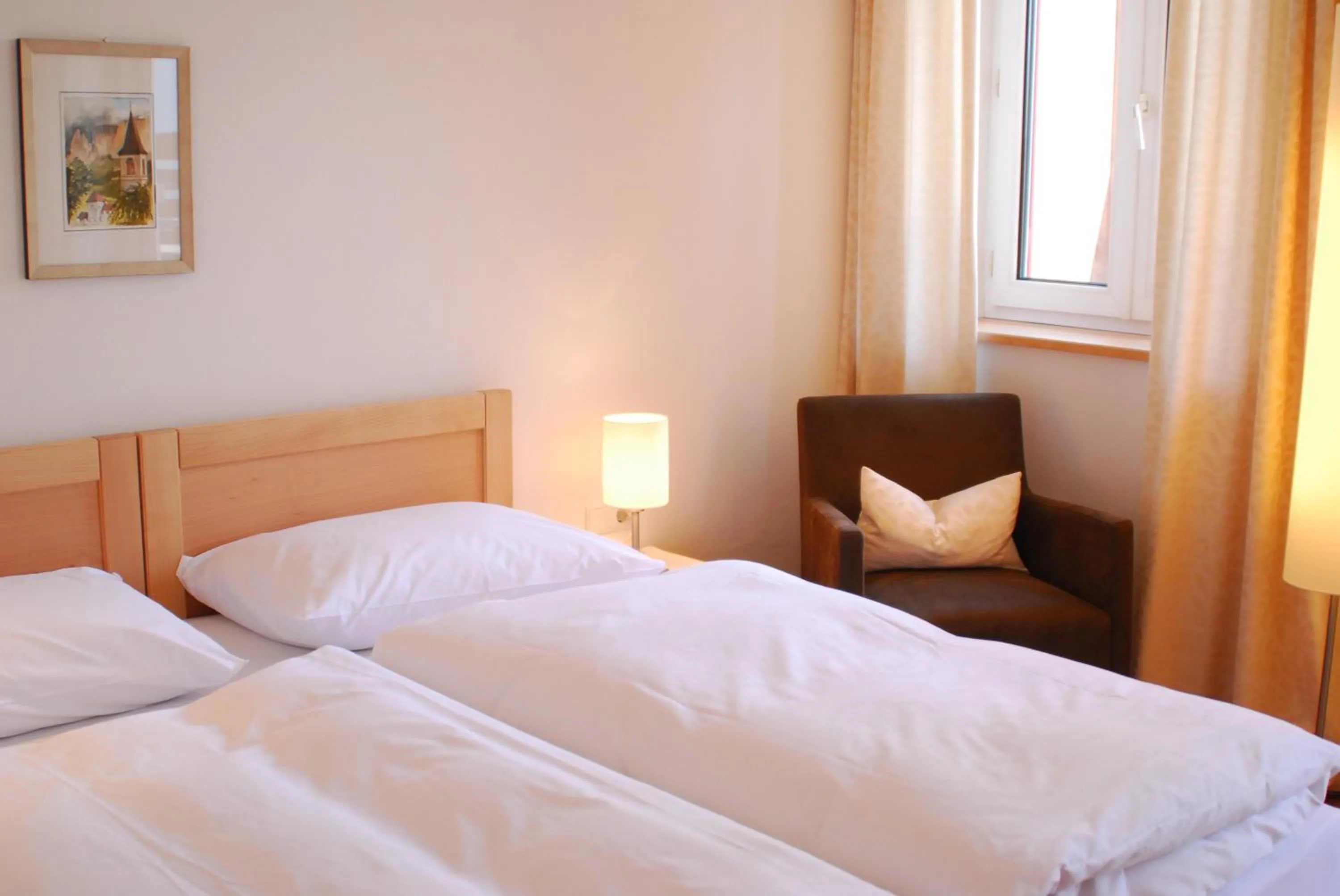 Bed in Hotel Dolomiten