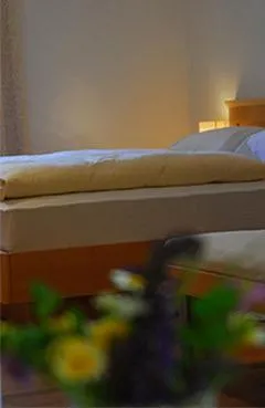 Bedroom, Bed in Hotel Dolomiten
