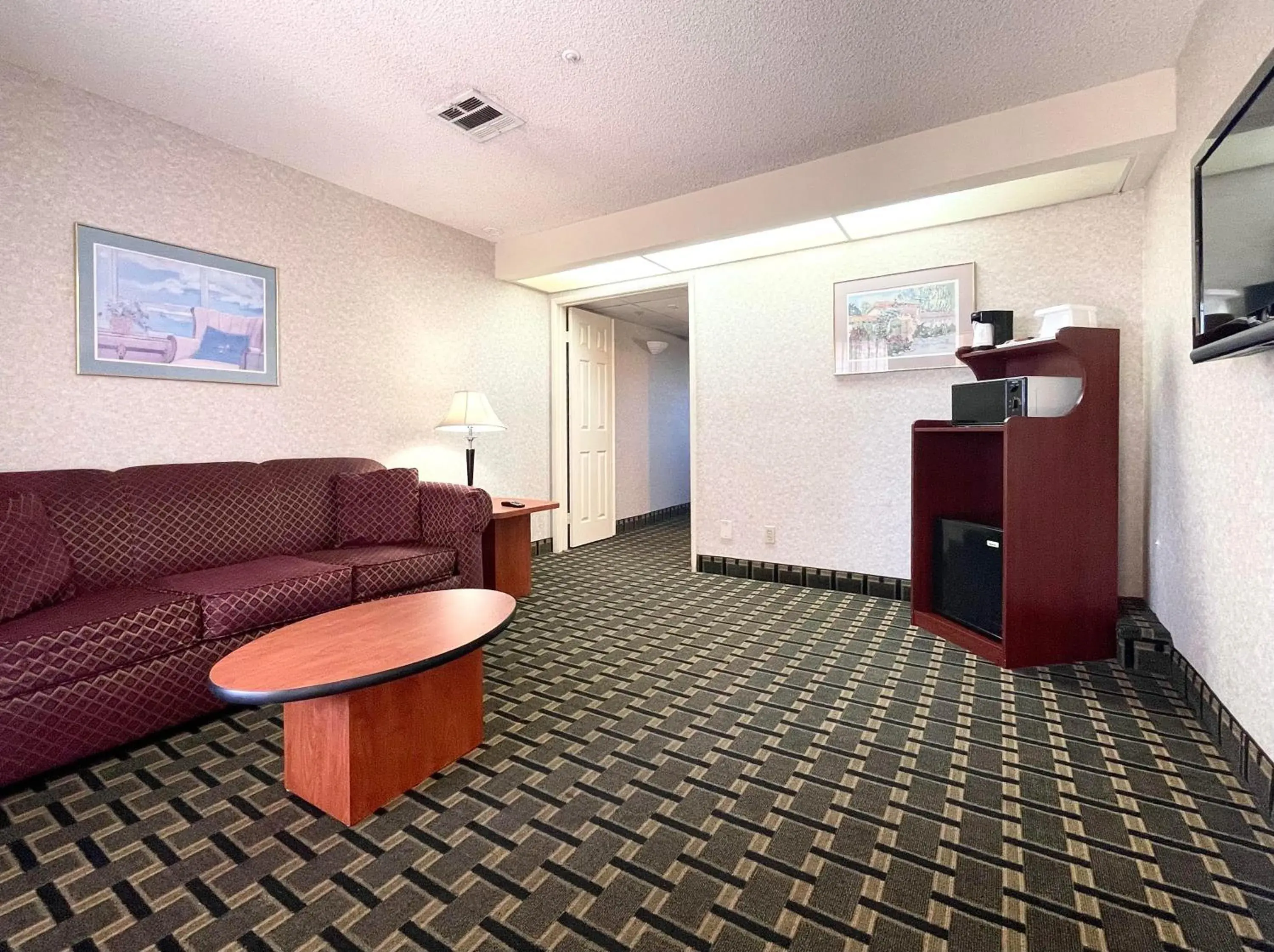 Living room in Ramada by Wyndham South El Monte Living room in Ramada by Wyndham South El Monte