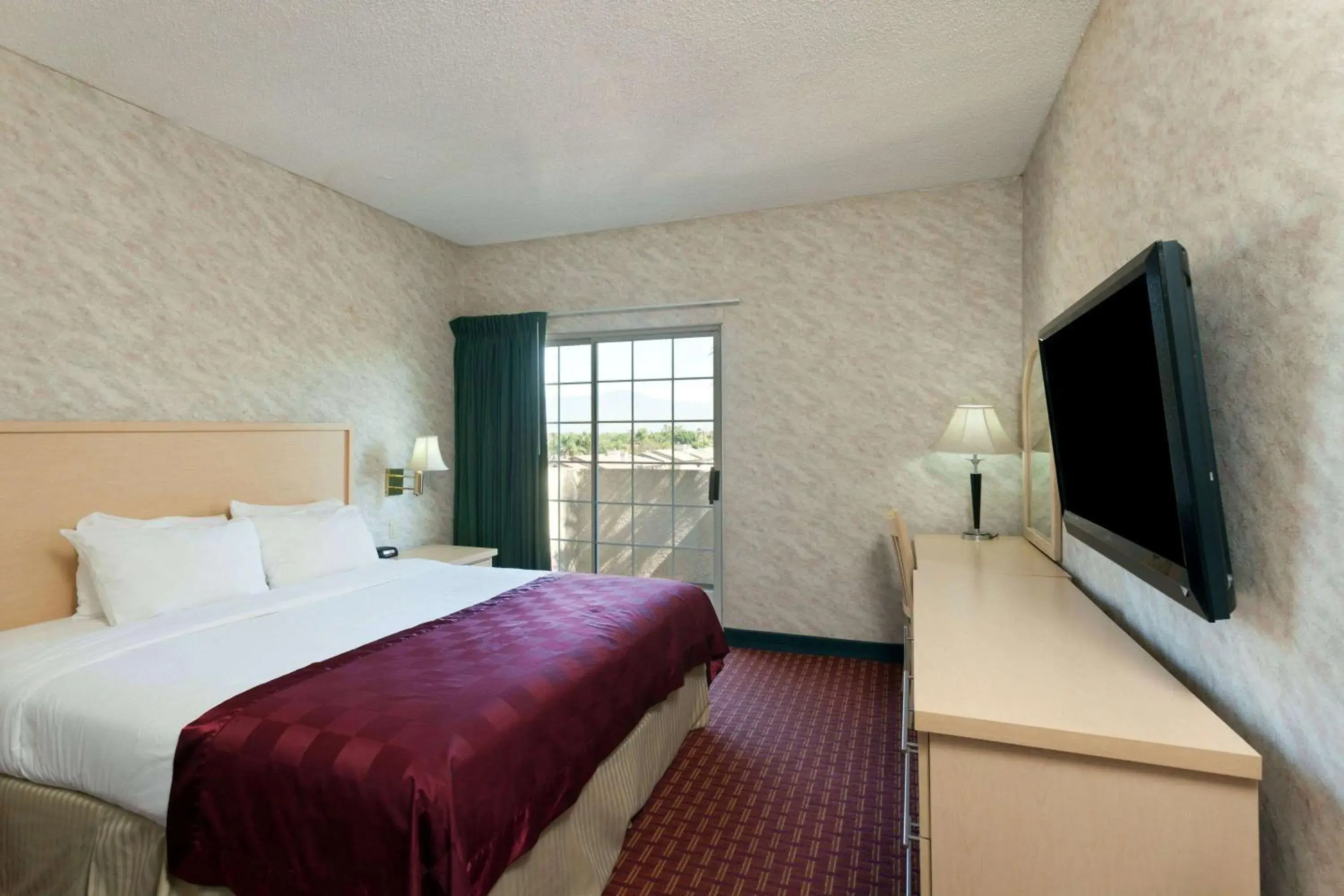 Photo of the whole room, Bed in Ramada by Wyndham South El Monte Photo of the whole room, Bed in Ramada by Wyndham South El Monte