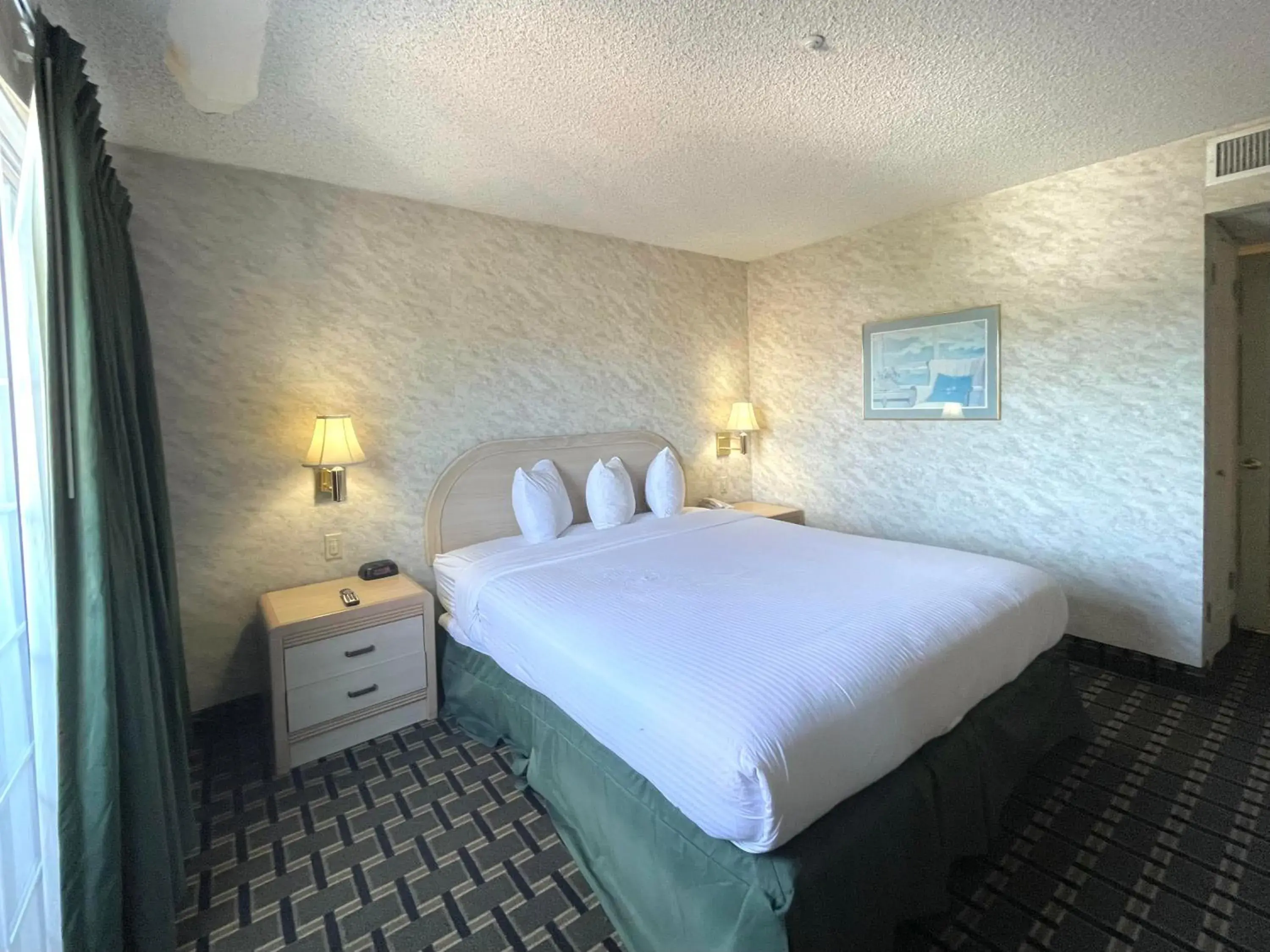 Bedroom, Bed in Ramada by Wyndham South El Monte Bedroom, Bed in Ramada by Wyndham South El Monte