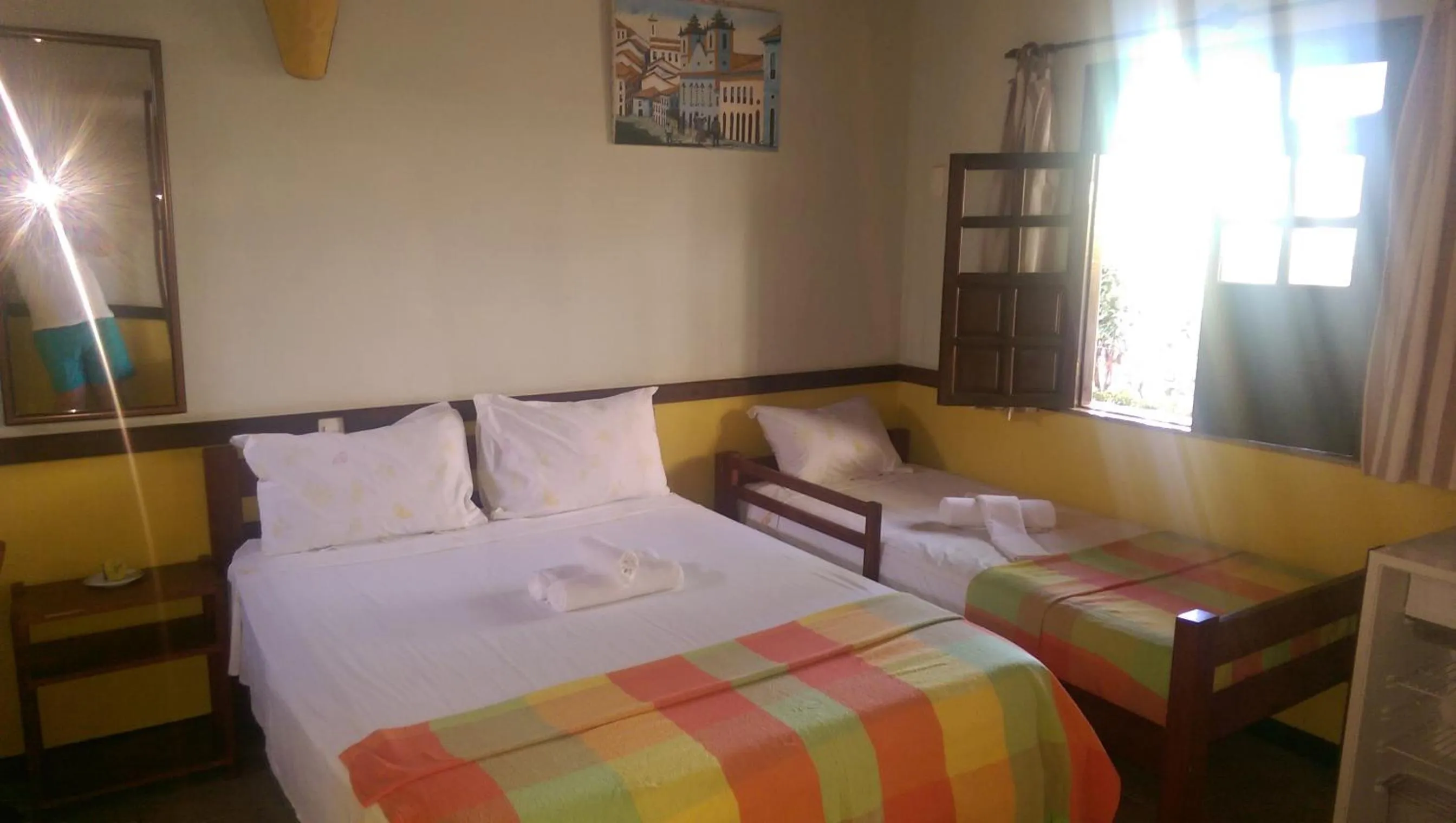 Bed in Pousada Tropicalia