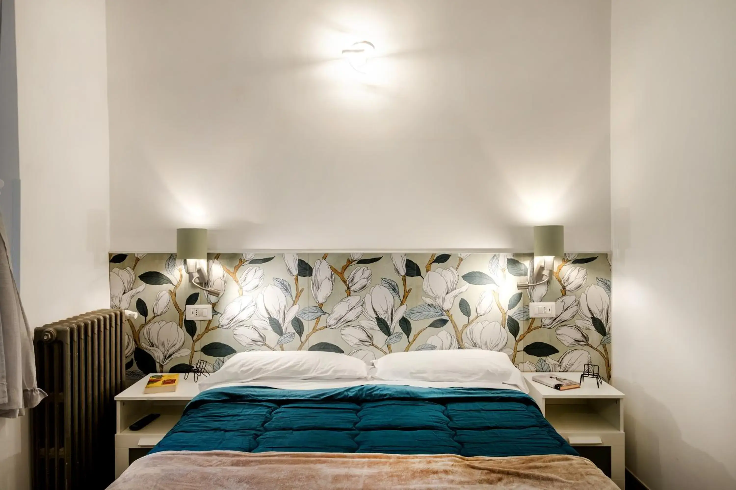 Decorative detail, Bed in Vatican36 Guest House Decorative detail, Bed in Vatican36 Guest House