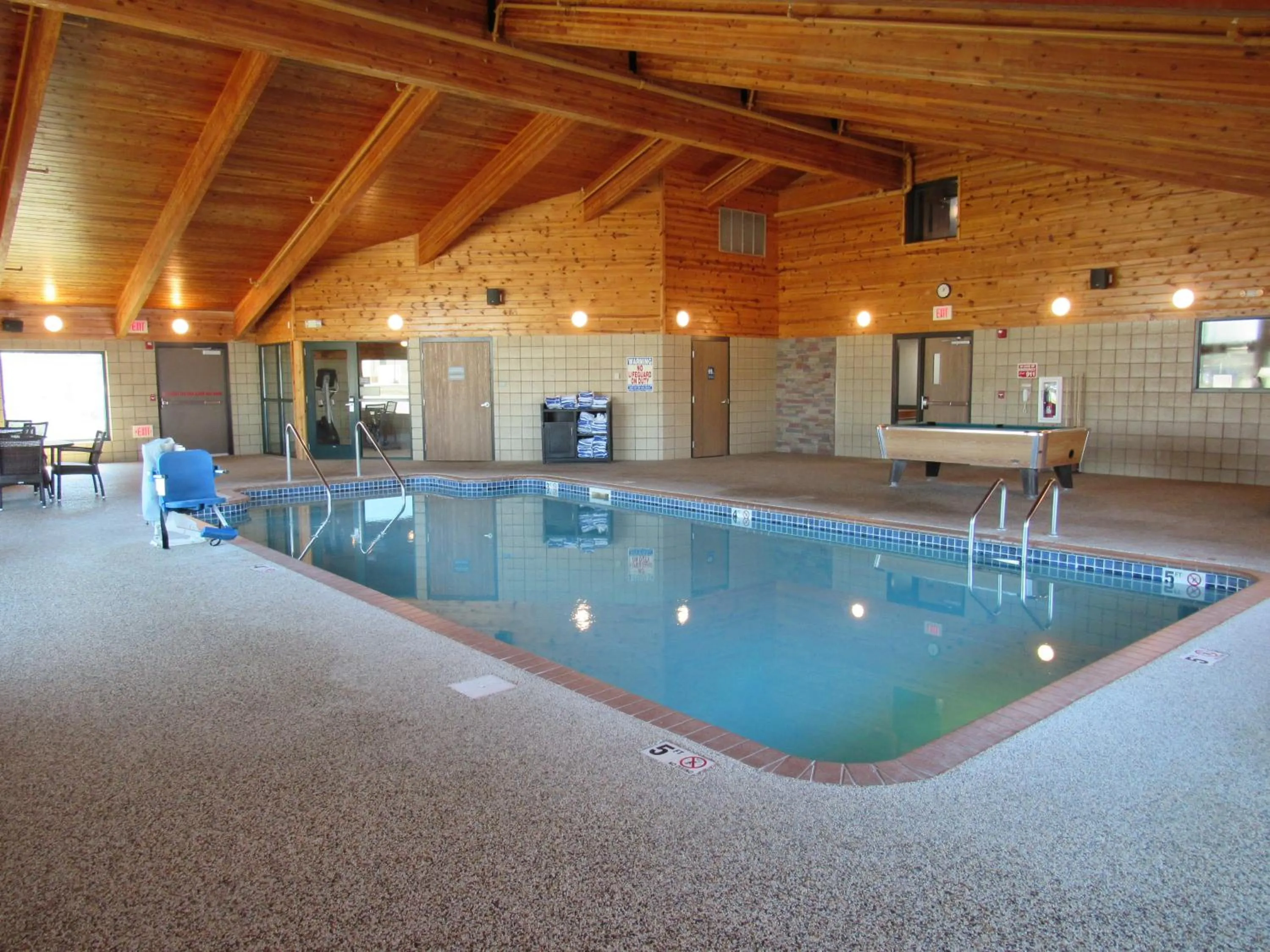 Swimming pool in AmericInn by Wyndham Lincoln South